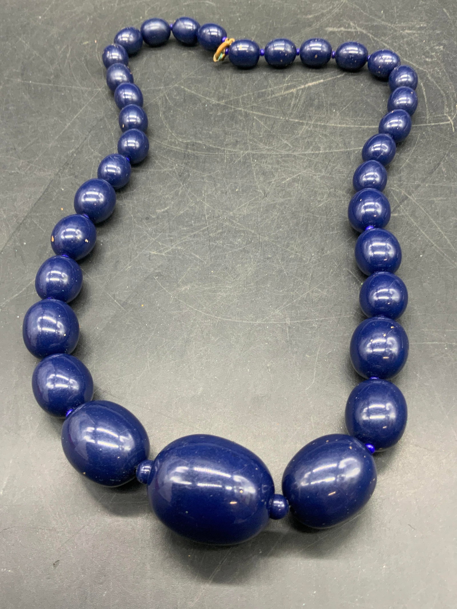 Blue Graduated Bead Necklace, Jewelry: A graduated blue composite bead necklace. Secures with a c spring closure. Necklace length measured end to end approx. 24 inches. Some residue and surface wear present. Jewelry, accessories, Fashion J