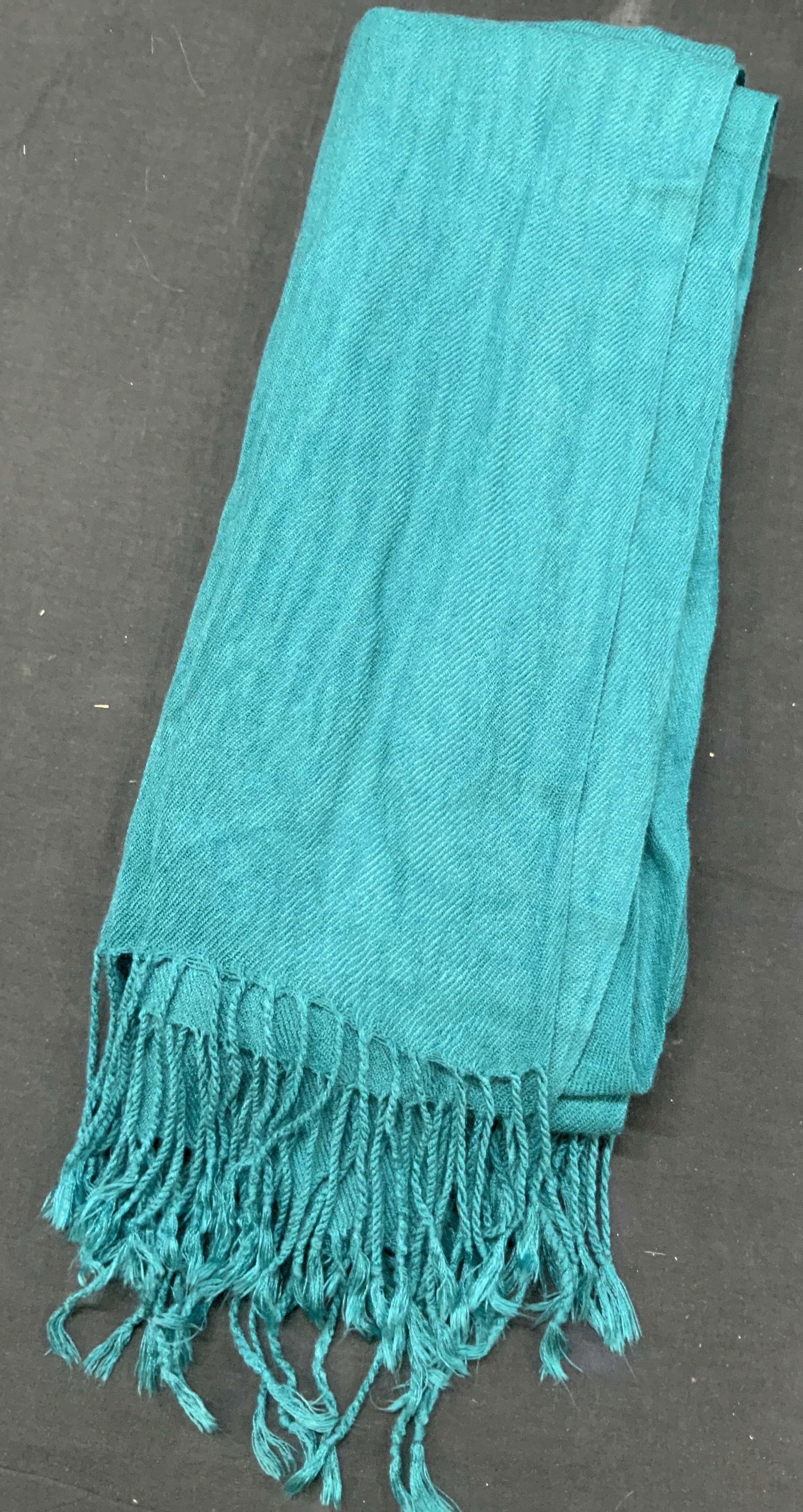 Teal Tn Cashmere Fringe Shawl/ Scarf: Teal toned scarf/ shawl with fringe edges. Possibly made of Cashmere or cotton blend. Approx 60 x 26 inches. Minor wearing to fabric due age and use. Cashmere scarf, shawl, shoulder shawl,. Cashmere s