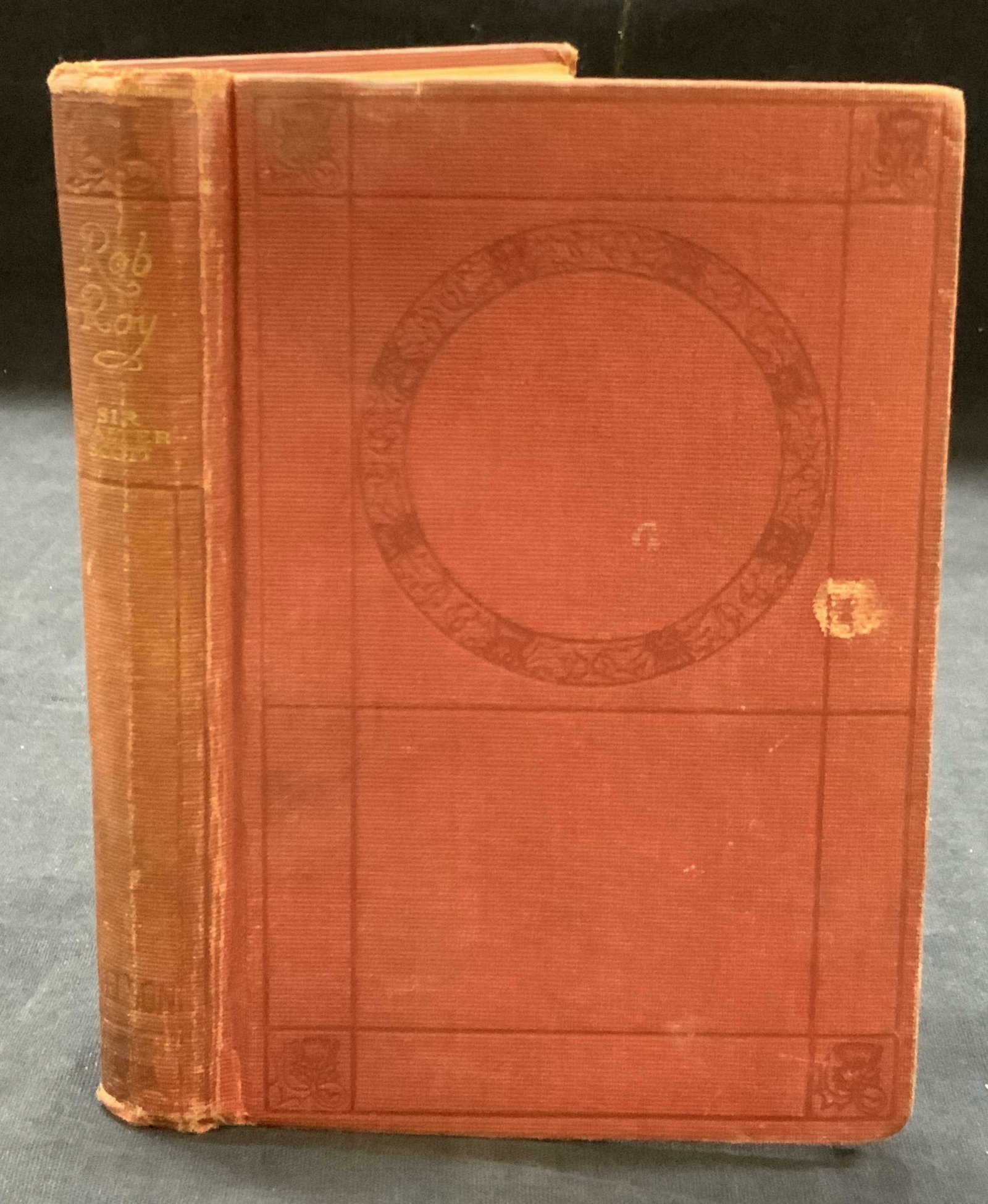 Antique Rob Roy By Sir Walter Scott Book: Antique book, copyright unknown. Titled Rob Roy, by Sir Walter Scott, published by T.Nelson & Sons ltd. Printers and publishers. Red bound hardcover book with gilt text. Approx 6.25 x 5 and 1 inch thi