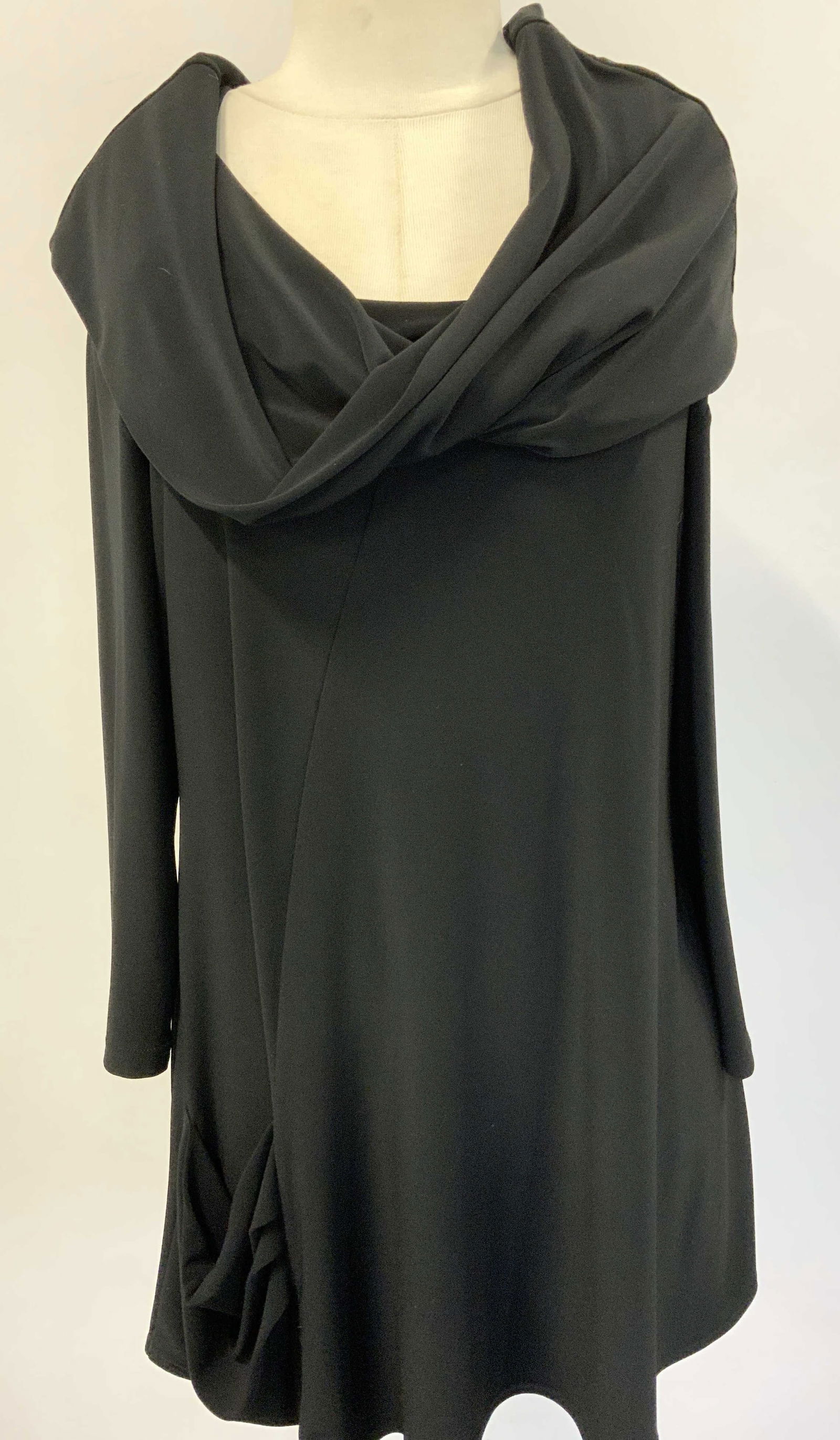 Sympli Black Cowl Neck Long Sleeve Dress, Canada: Designer Sympli black dress, size 10. Polyester with spandex. Wide cowl neck. Side pocket. Many ways to wear dress due to straps and drapes neck line fabric. Can be worn as a short dress or long shirt