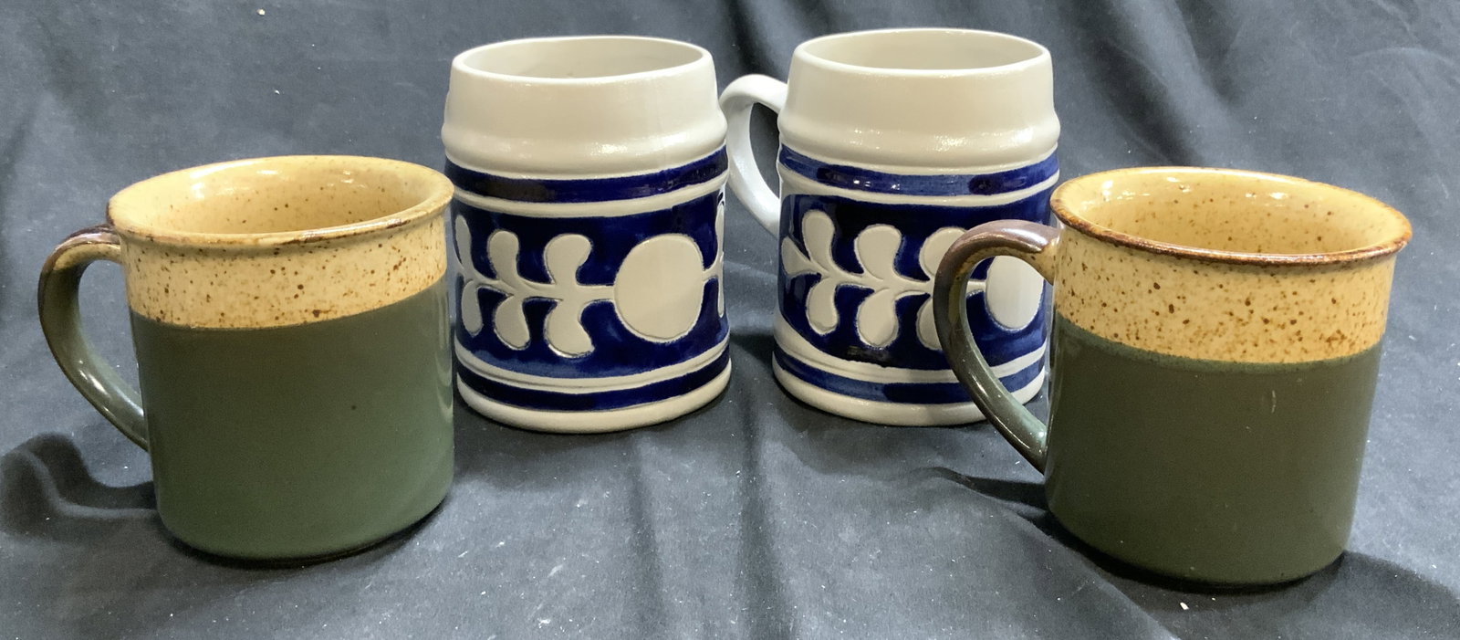 COLONIAL WILLIAMSBURG 4 Salt Glazed Mugs & More: Underside of 2 mugs are inscribed AN APPROVED WILLIAMSBURG SOUVENIR. Each mug is slag glazed ceramic. Slate with blue toned detail. Lot also includes dark green, & sand tones. Largest mugs measure app