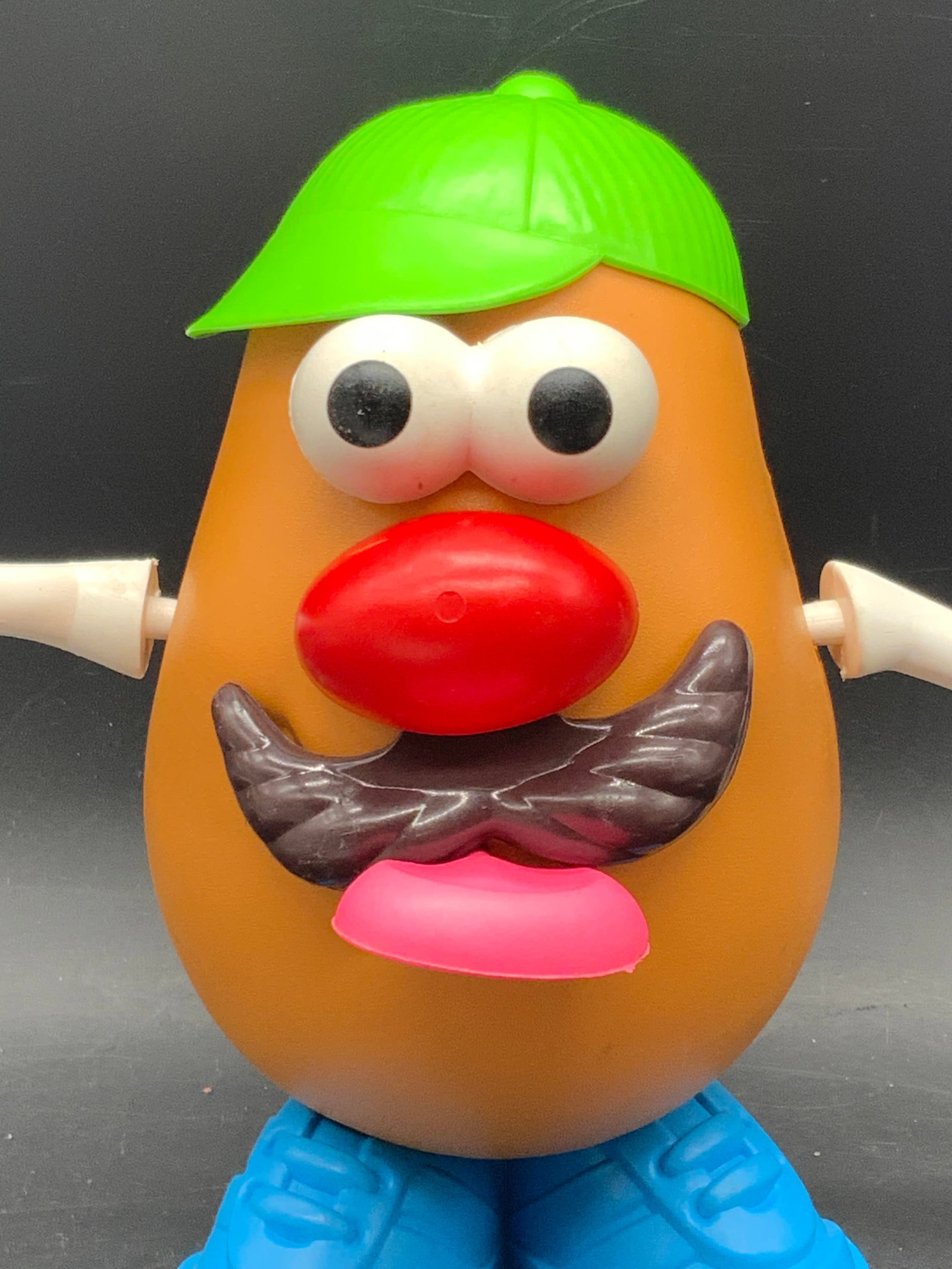 1985 PLAYSKOOL Mr. Potato Head Toy W Accessories: A vintage Mr. Potato Head toy. Comes with accessories. Includes a cap, tongues, shoes, arms, and more. Interior reads 1985 PLAYSKOOL Inc. Potato body measures approx. 5.5H x 4Win. Discoloration and su