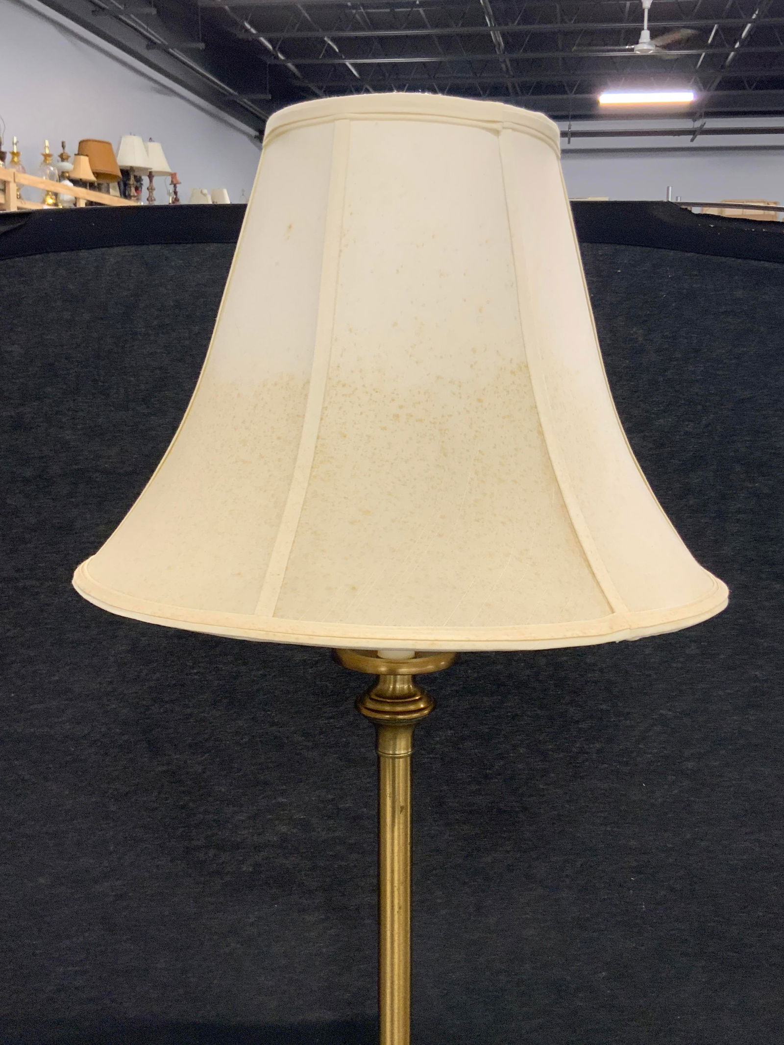 Vintage Brass Floor Lamp W/ Shade: A vintage metal, possibly brass, floor lamp with a fabric shade. Corded. Measures approx. 59H x 16W in. Measurement includes lampshade. Some surface wear and discoloration present. Not tested for func