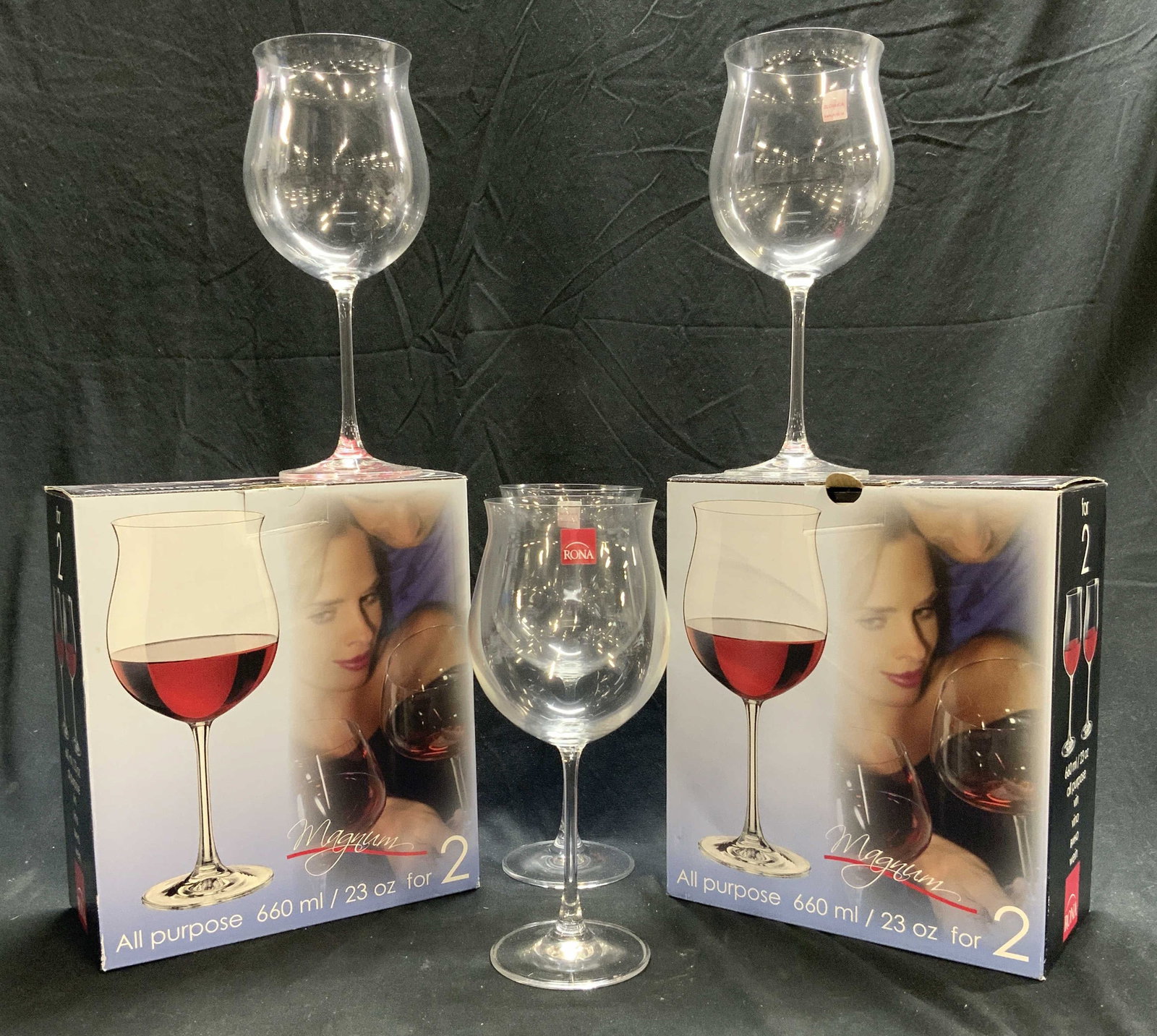 MAGNUM Set 4 Crystal Stemware Wine Glasses W Boxes: Boxes trademarked MAGNUM RONA. Lot includes 2 boxes. Each includes 2 crystal stemware wine glasses. Each one glass measures approximately 9.5 inches tall 4 inches wide. Each glass has tag which reads 