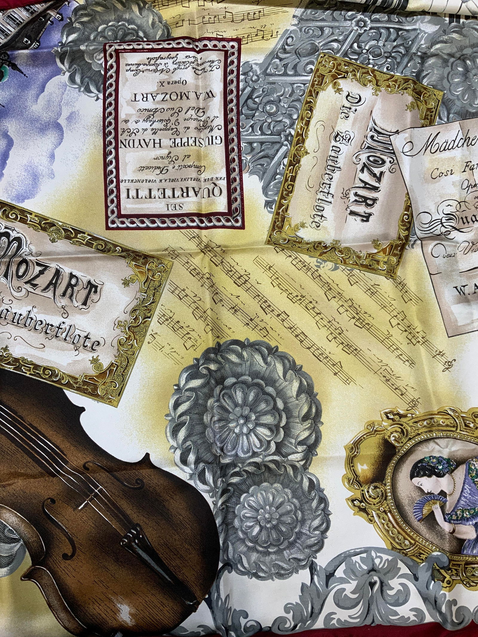 SALDARINI Music Motif Silk Scarf, Italy: SALDARINI silk scarf with music motif in red and white. Signed on tag. Made in Italy. Measures approx. 34 x 34 inches. Some wear to material consistent with exposure. SALDARINI, SALDARINI scarf, ladie