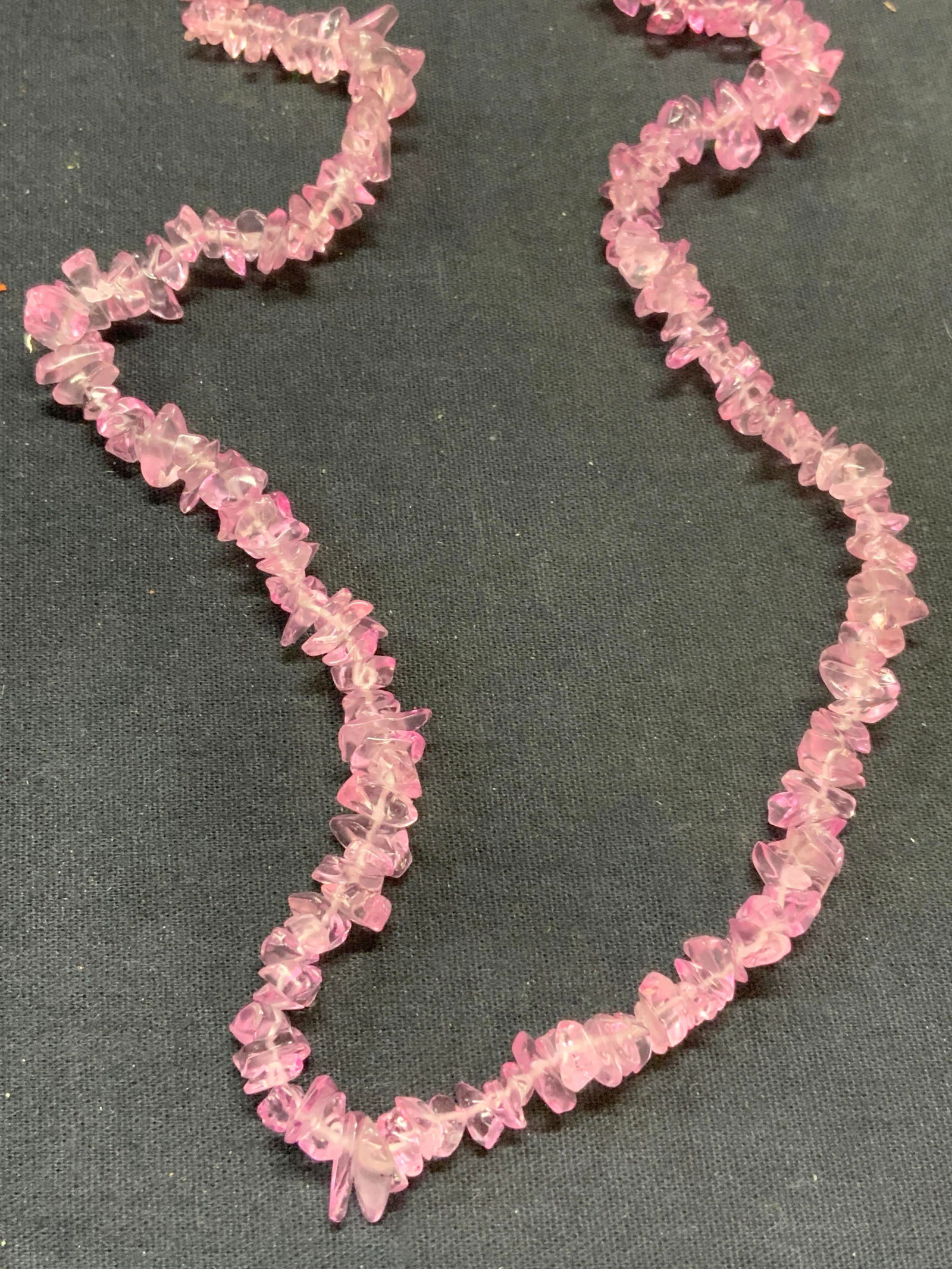 Pink Glass Chip Beaded Necklace: Pink glass chip beaded necklace. Drop length approx. 16 inches. Some surface wear including scratching observed. Estate jewelry, costume jewelry, cocktail jewelry, fashion jewelry, accessories, fashio
