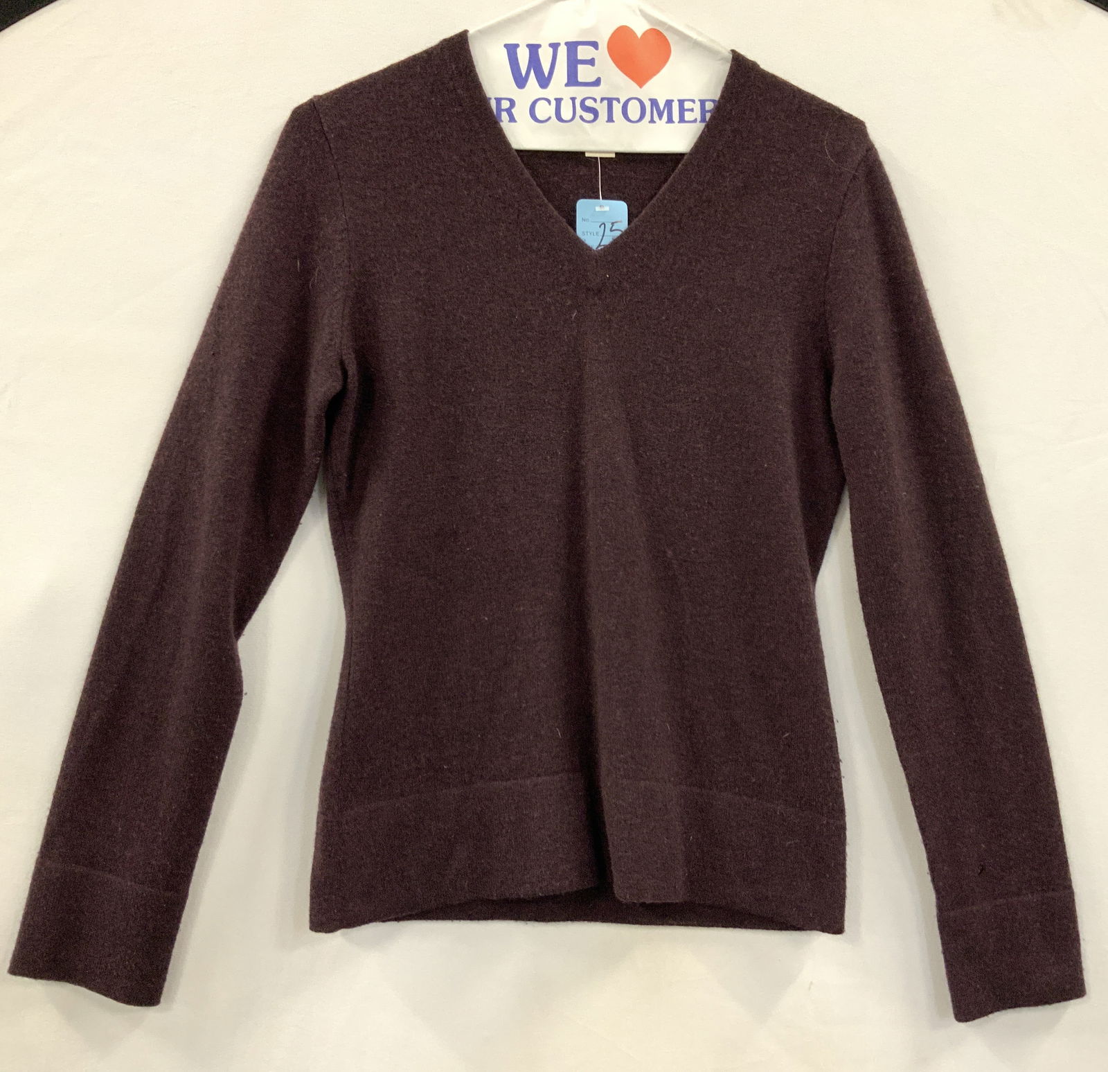 TSE Pure Cashmere Sweater: Marked TsE size small, pure cashmere long sleeve v neck sweater, sleeve measures 17 inches long. Chest measures 15 inches across and torso measures 22 inches long. Evident hole to sleeve. Pure cashmer