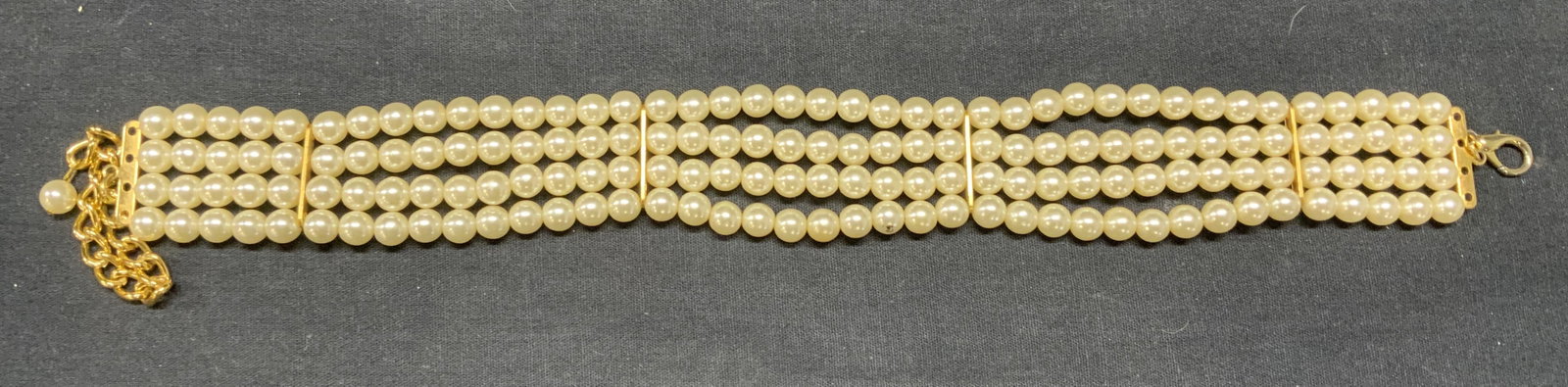 Gold Tone Faux Pearl Multi Strand Choker Necklace: Gold tone faux pearl multi strand necklace. Measures approx. 16.5 inches long. Some scratching observed. Estate jewelry, costume jewelry, cocktail jewelry, fashion jewelry, accessories, fashion access