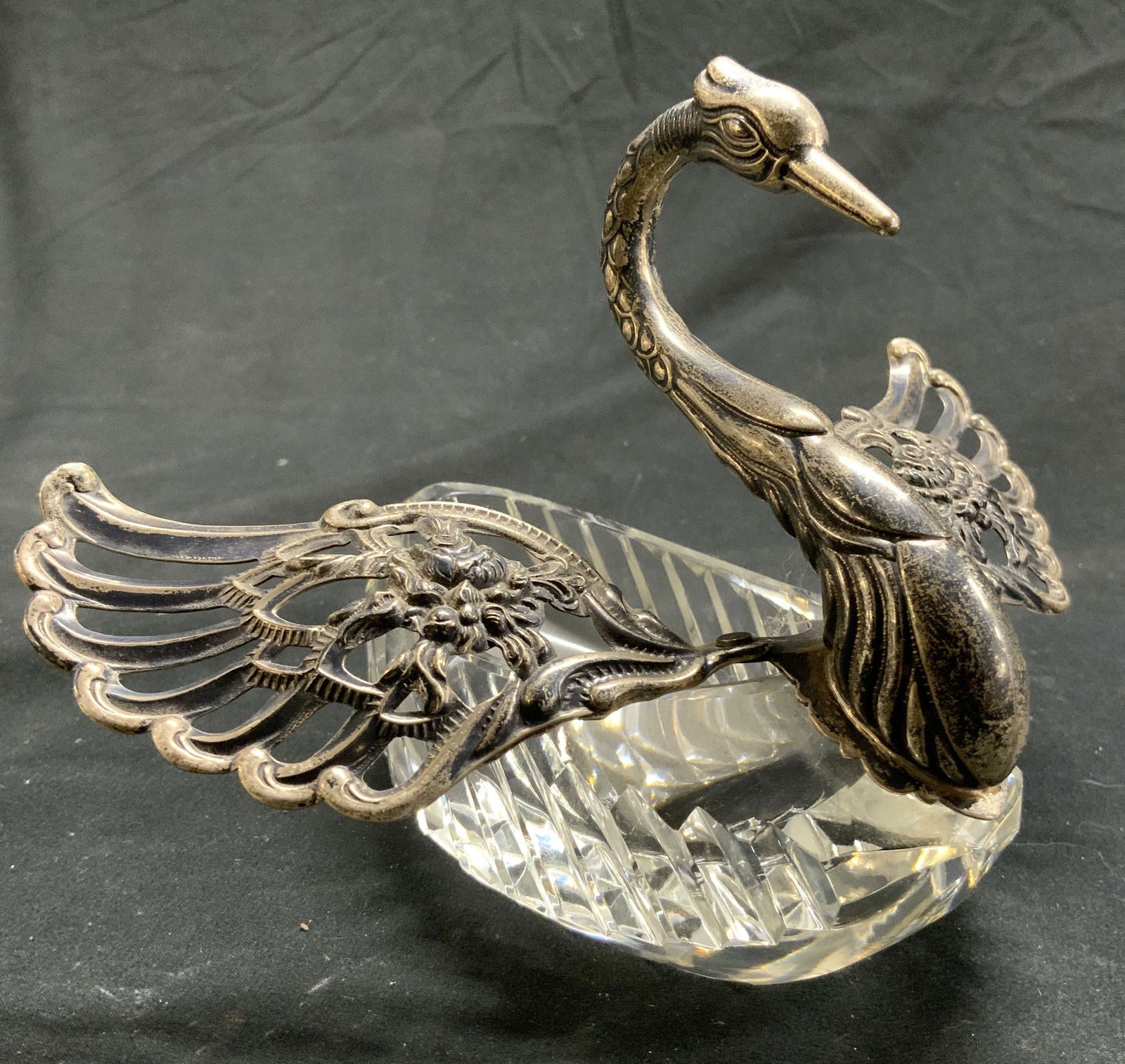 Sterling Silver & Crystal Swan Salt Cellar: Salt cellar has sterling silver neck and wing areas with cut crystal basin area. Metal area tests positive for sterling silver with PuriTEST Tester. Wings have pierced & relief detail. Wings are artic