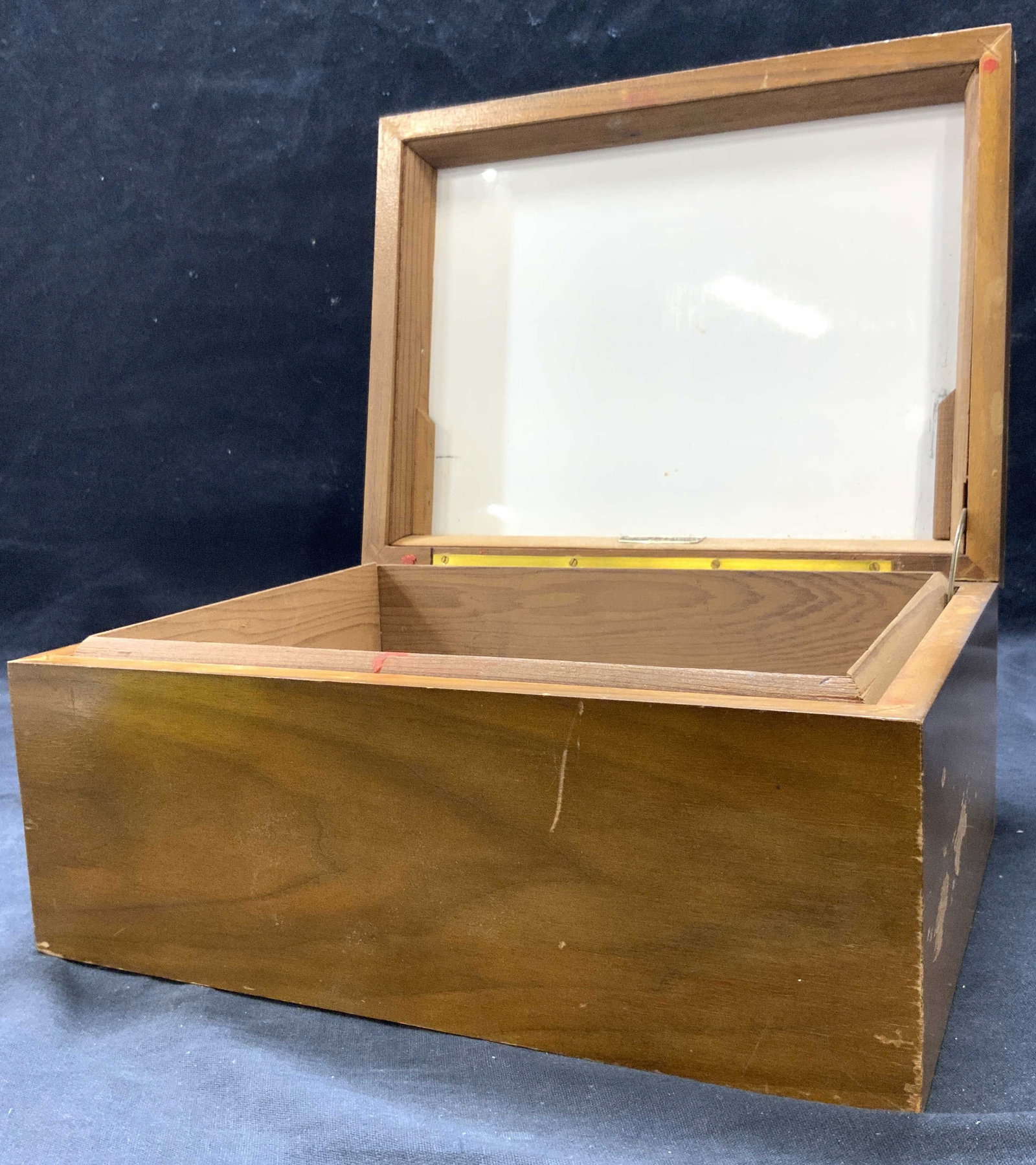DUNHILL Wooden Humidor W Hinged Lid LONDON: Tag on interior reads DUNHILL LONDON, NEW YORK. Humidor is tan toned & wooden. Piece has hinged lid. Humidor measures approximately 11 inches wide 8.5 inches deep 5 inches tall. Humidor, wooden humido