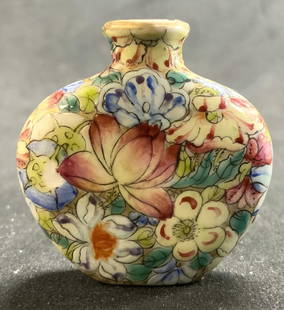 Signed Vntg Hand Painted Asian Snuff Bottle: Underside is signed with Asian characters. Snuff bottle is vintage. Piece is hand painted and porcelain. Bottle has intricate multi toned floral and leaf detail. Snuff bottle measures