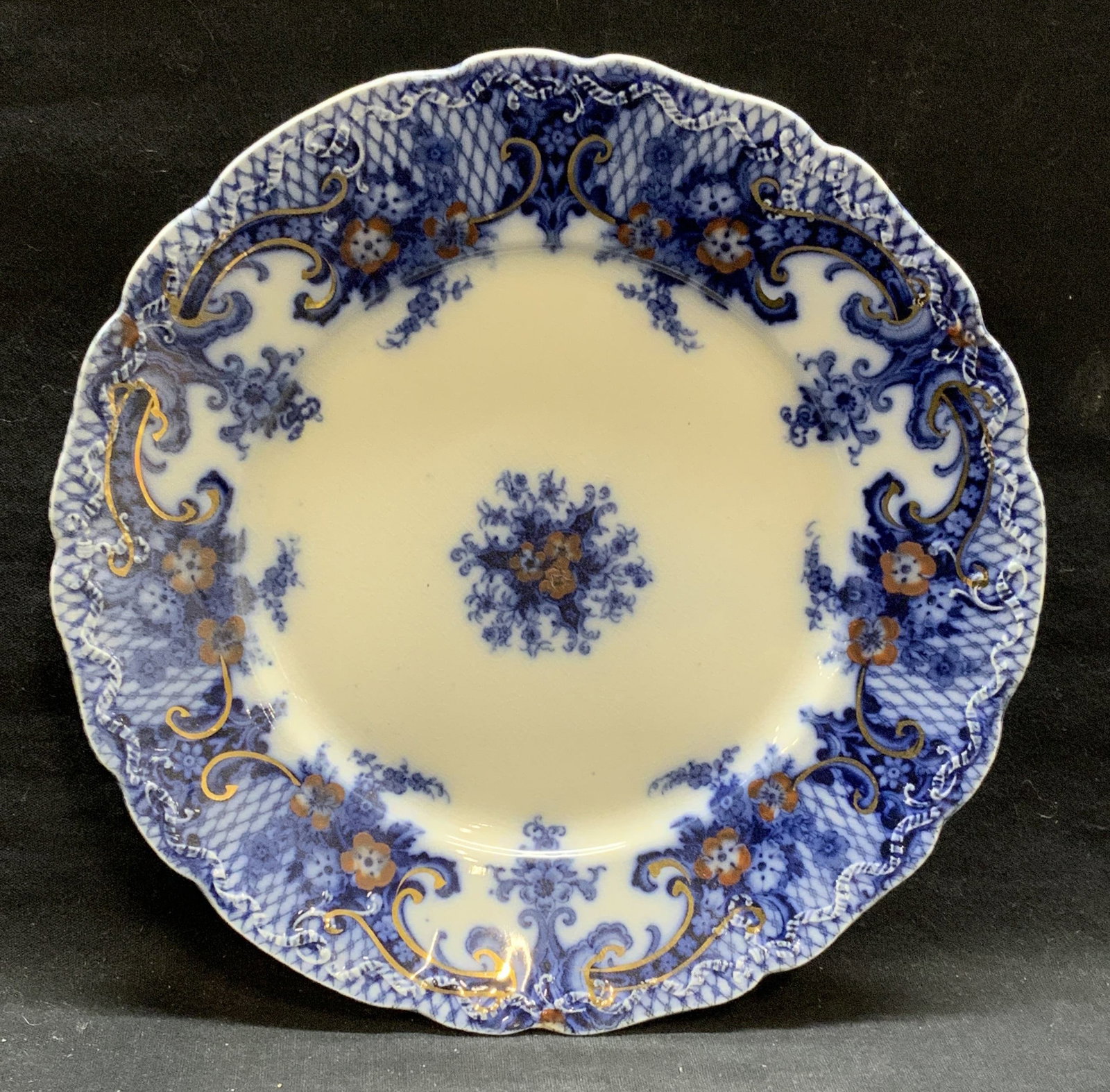 Antique Wood & Son Royal Porcelain Plate England: Antique Wood and Son semi porcelain plate in Royal pattern with gilt decoration. Measures approx. 9 inches diameter. Surface wear including crazing, scratching and loss to gilt observed. Trademarked t