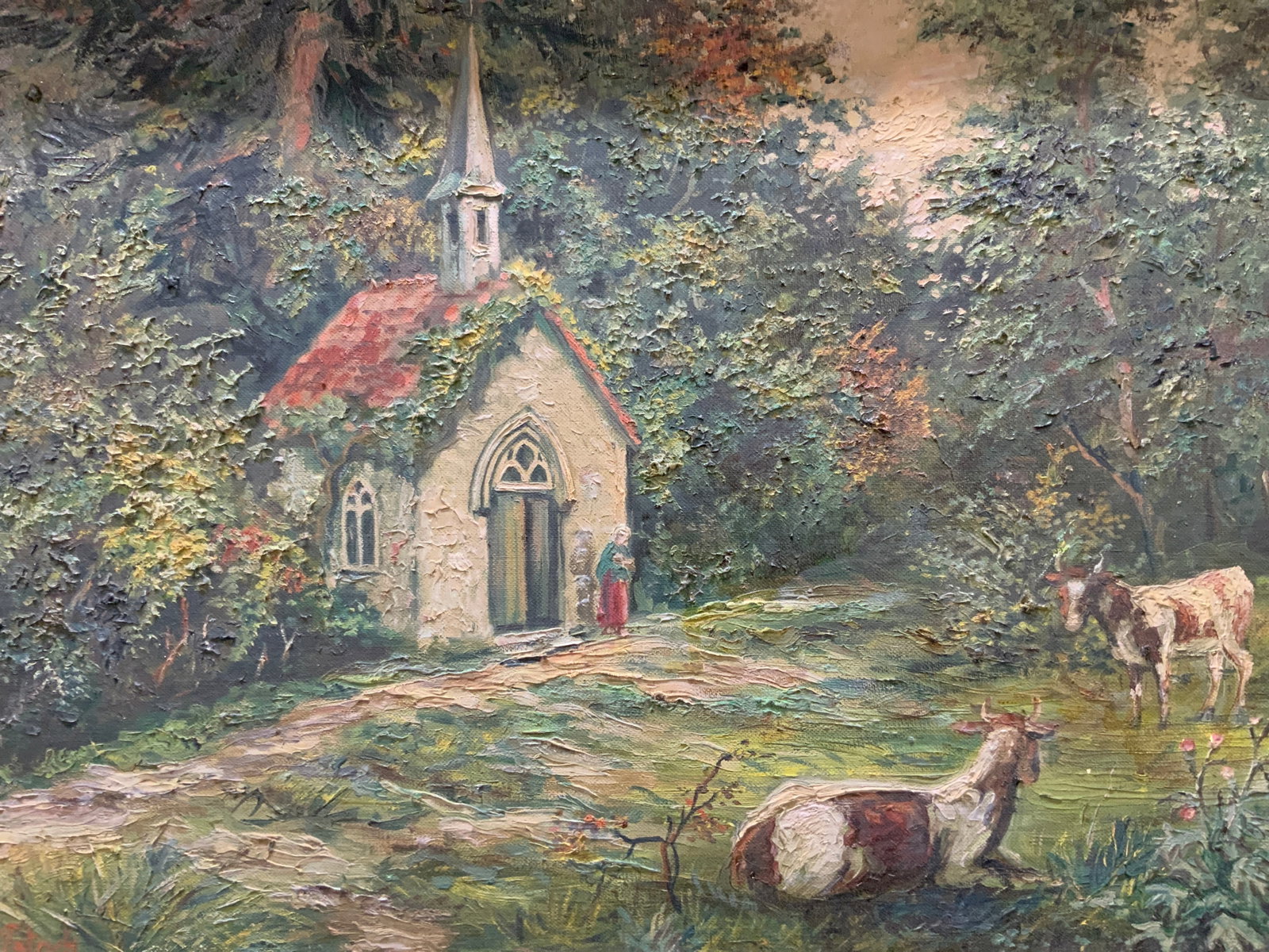 Signed & Framed Oil Painting Rural Church: Oil paint on canvas. Signed in lower left corner. Subject depicts bulls outside of a church in a wooded area. Framed in gilt wooden frame. Frame measures approx. 22 W x 18 H in. Window measures approx