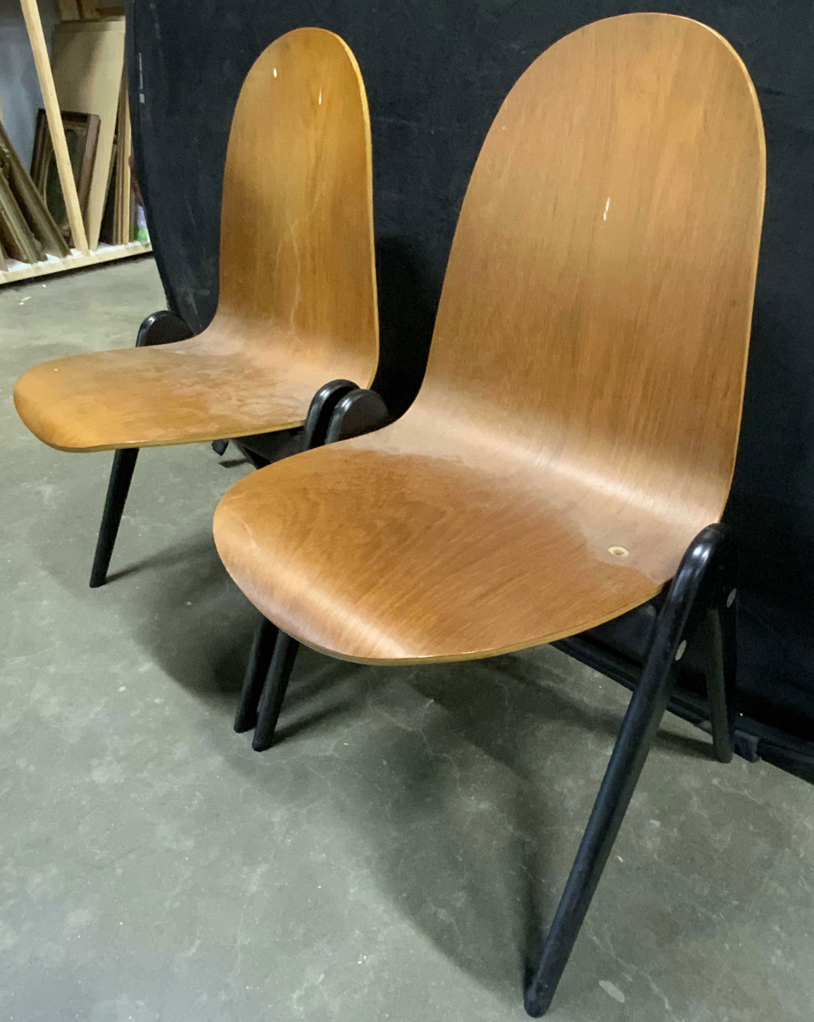 Pr Vntg Swedish Yngve Ekstrom Knockdown Style Chairs: A pair of vintage Yngve Ekstrom Knockdown Style chairs. Crafted from wood and metal materials. Brown and black hues. Measures approx. 34.75H x 19W x 16.25D in. Chairs are stamped SWEDEN on the undersi