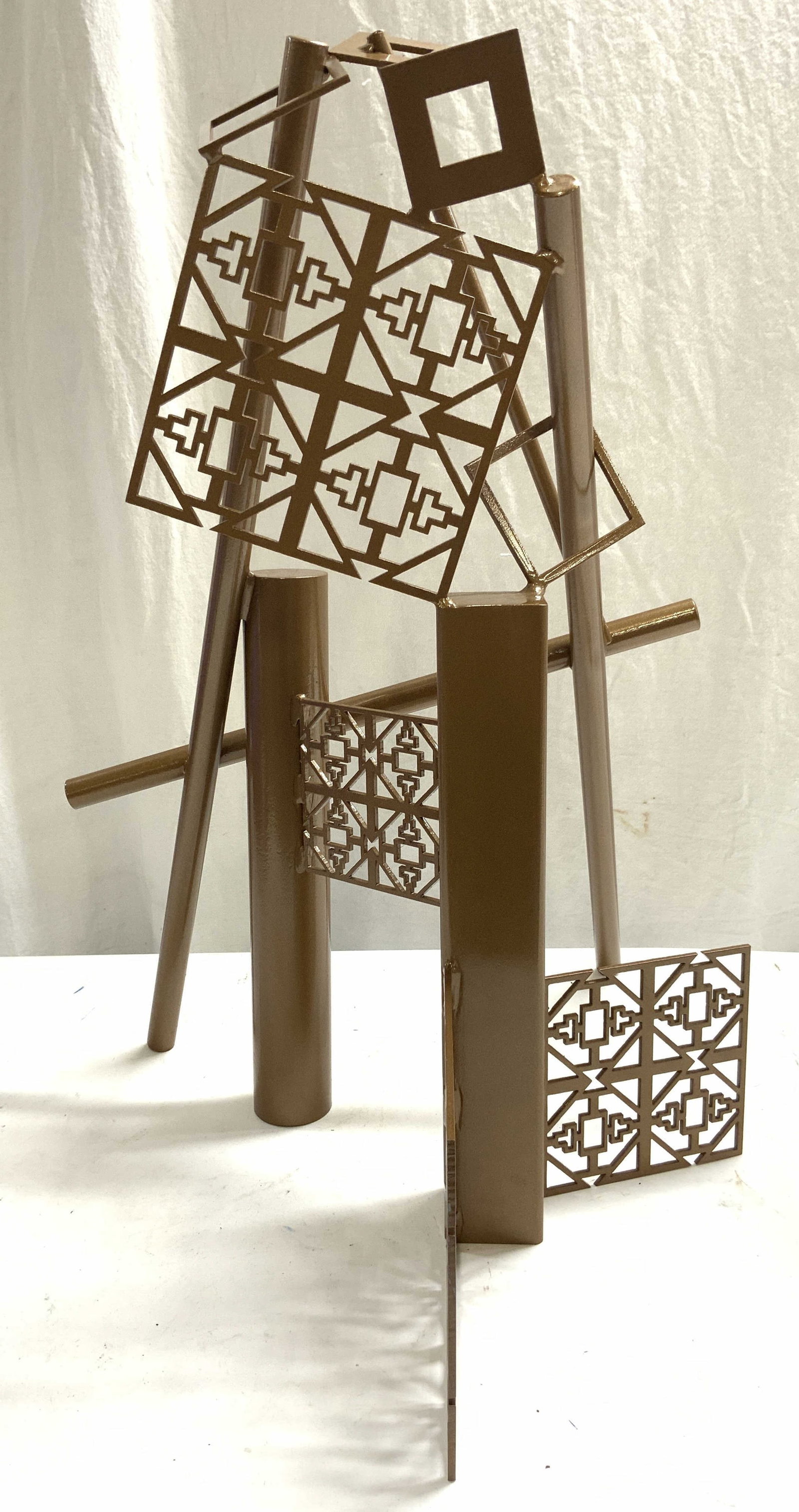 CHERYL FARBER SMITH Geometric Steel Sculpture 2ft: Sculpture signed CFS. Piece is bronze toned & crafted from steel. Piece is crafted with a series of cylindrical, square & other geometric structures. Sculpture is finished in car paint. Piece measures