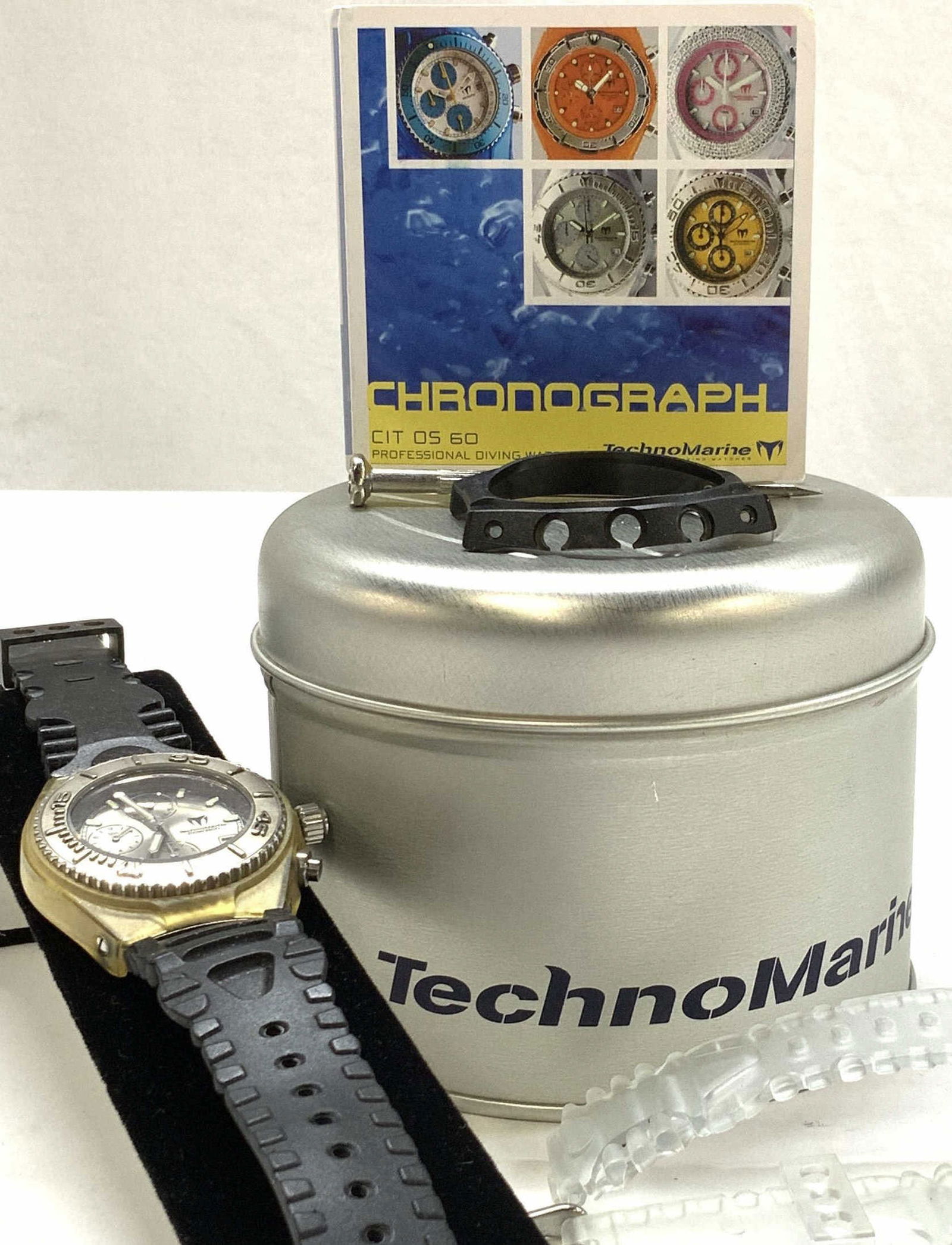 Techno Marine Chronographic 20 ATM Watch + Access: Professional diving watch by TechnoMarine. Water resistant watch , 200 meter depth, 20 ATM , Japan movement chronograph watch. Comes in the original box. And has additional clear wrist band and a blac