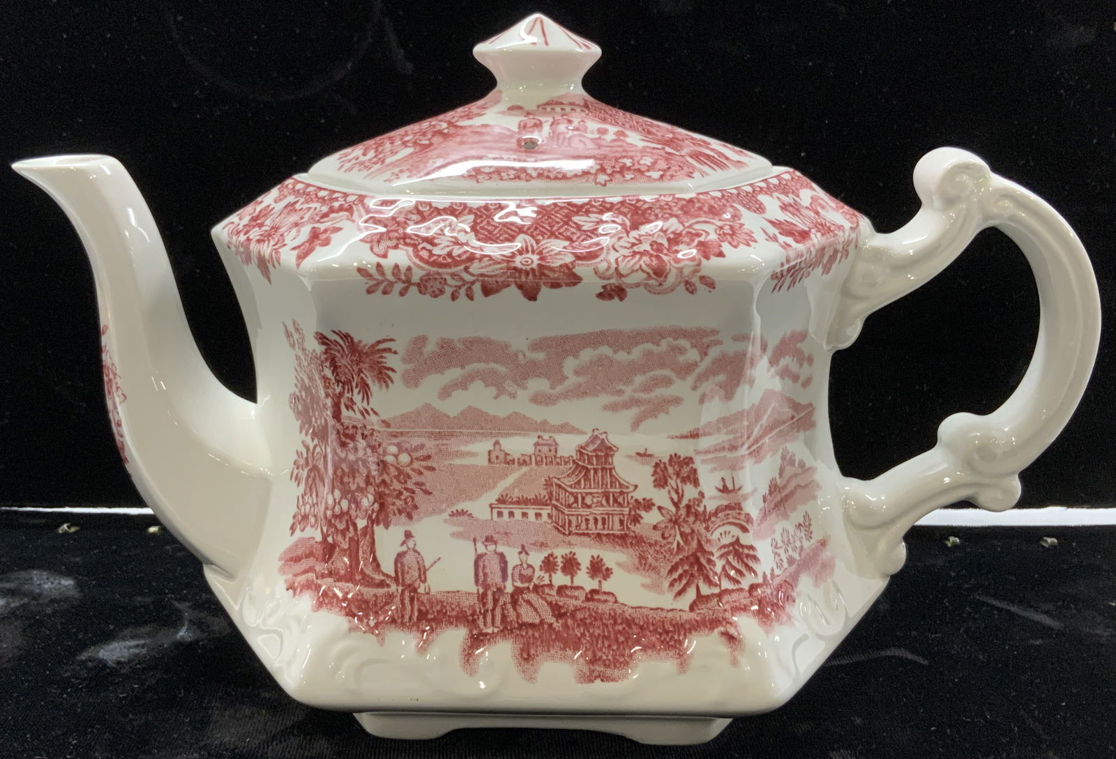 Woods Burslem Seaforth Porcelain Teapot, England: Chandelier appears to be antique possibly vintage. Piece has ornate detail with scroll, leaf, C curl and nymph head detail. Lower area has circular structure. Chandelier has 2 bulb sockets on each sid