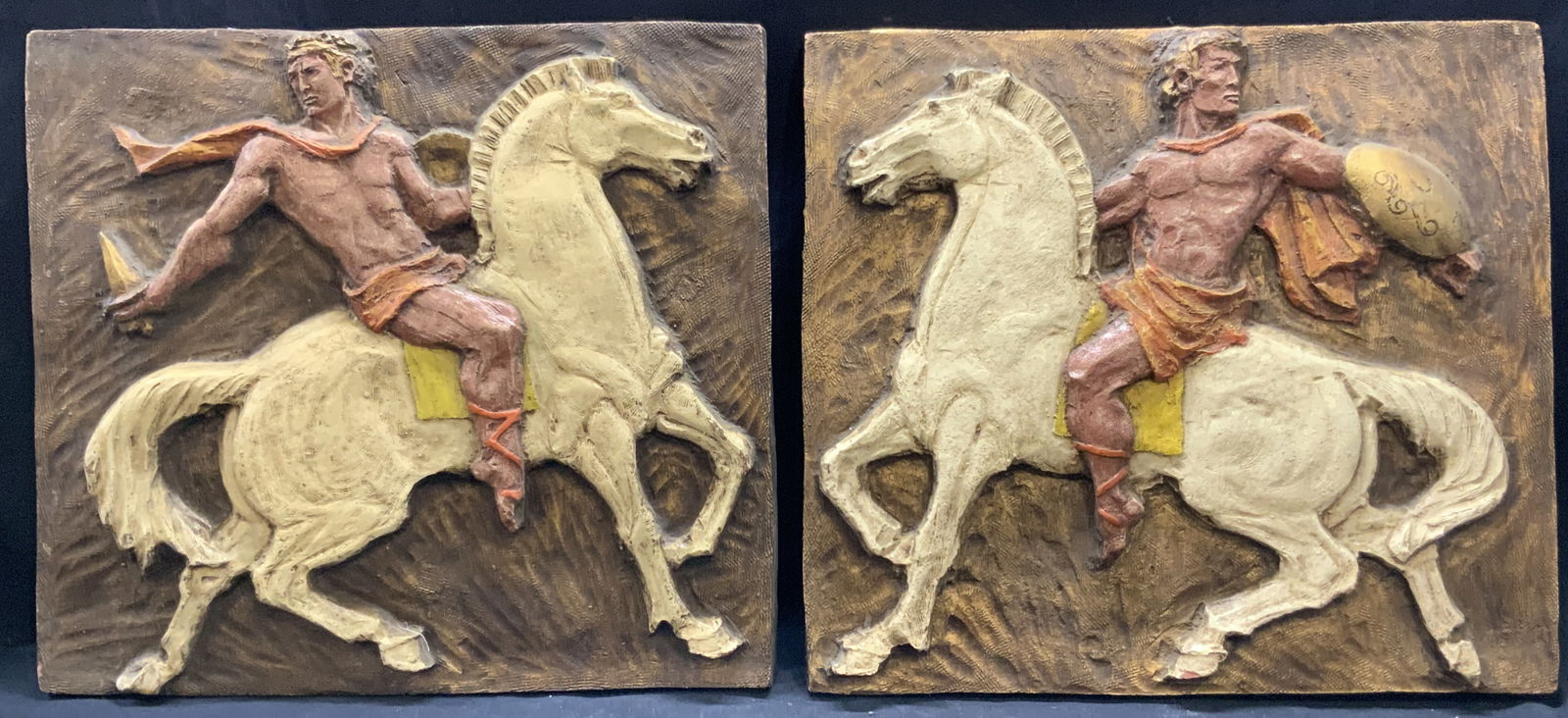 Juan Segura High Relief Sculptures Roman Soldiers: High Relief Sculpture made with fiberglass. Signed by Juan Segura.. Subject one has Inscription in lower right corner under relief J. Seg. Subject two has Inscription in lower left corner under relief