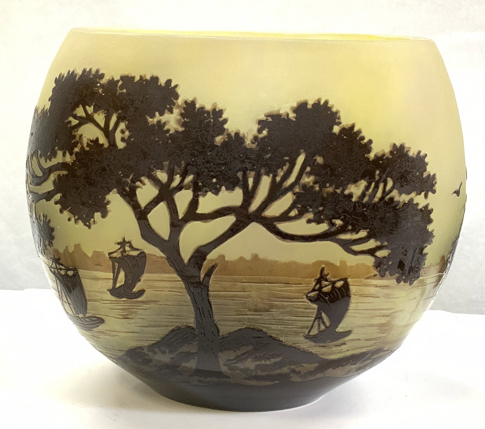 Antique Rare GALLE Cameo Glass Vase, France: Opaque rounded oval cameo glass vase in an opaque yellow with brown fused layer of trees and sailboats on water in the background. Signed Galle. Hand blown glass. Rare pattern. Thick walled, vase meas