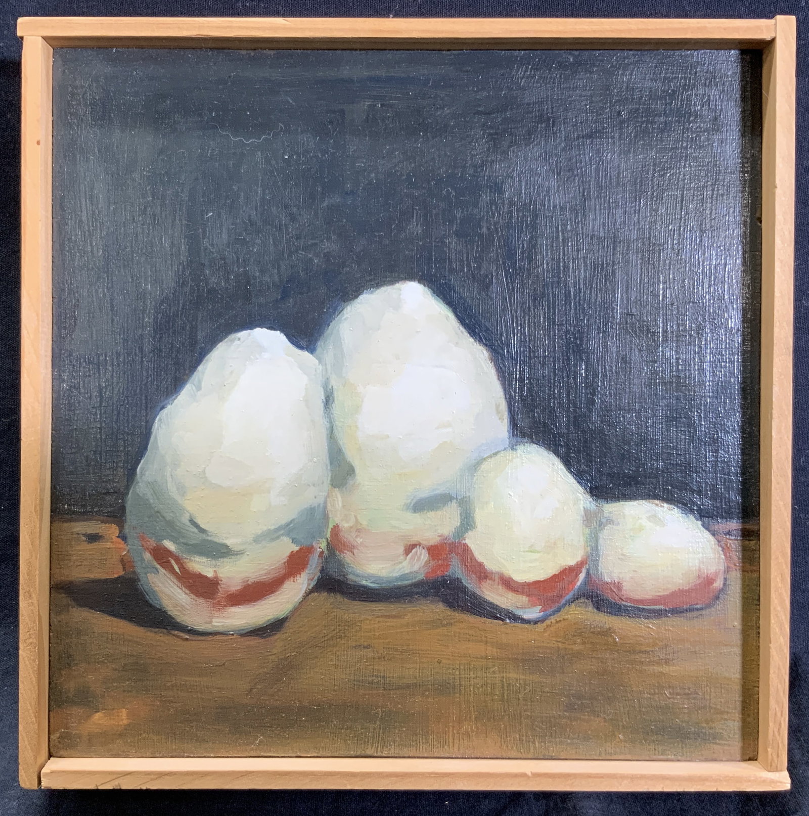 Framed Hard Boiled Egg Oil Painting: Oil paint on wood. Subject depicts a still life of half peeled hard boiled eggs. Framed in wooden frame. Frame measures approx. 9 h x 9 w x 2 d in. Window measures approx. 8.5 w x 8.5 h in. Not viewed