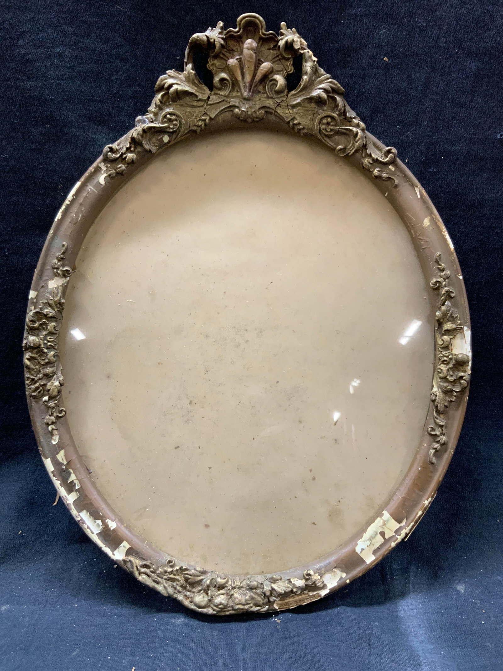 Vintage Oval Photograph Frame Glass Glaze: Ornate wooden frame with foliage and floral raised molding. Frame measures approx. 11 W x 14.25 H in. Window measures approx. 9.25 W x 11 H in. Not viewed without backboard. Cracking and losses to mol