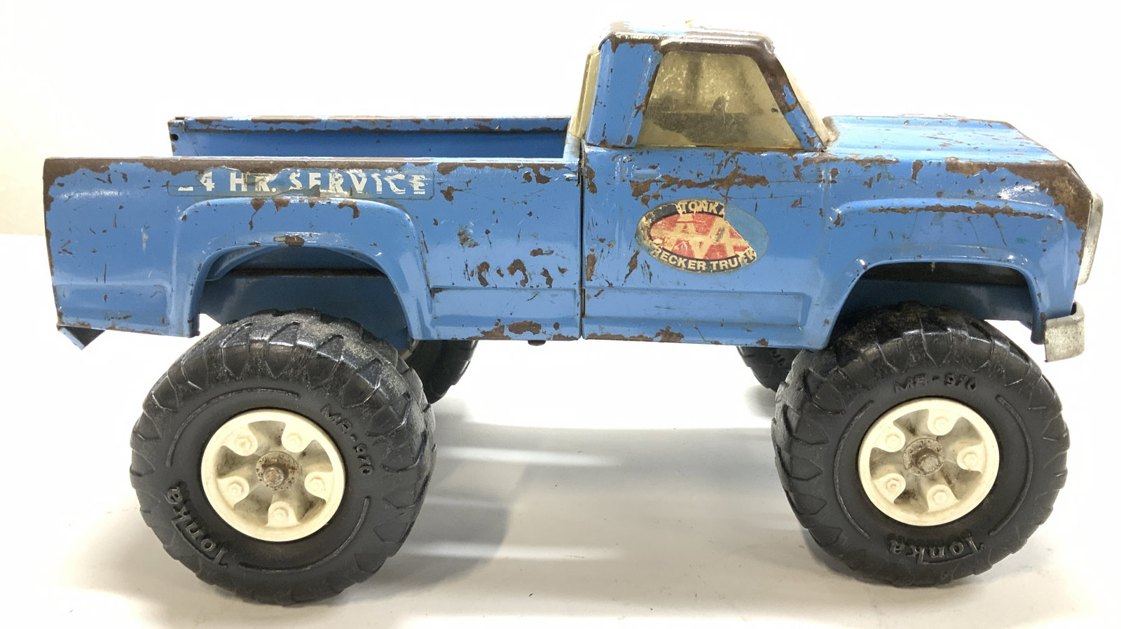 TONKA Vintage AA Wrecker Toy Truck: Vintage TONKA AA wrecker toy truck, Painted cornflower blue on steel. Moderate wear to paint. TONKA wheels. Measures 7.5 in. Ht x 14.25 in. L x 7.5 in. Wide. Vintage TONKA tow truck, TONKA toys, colle