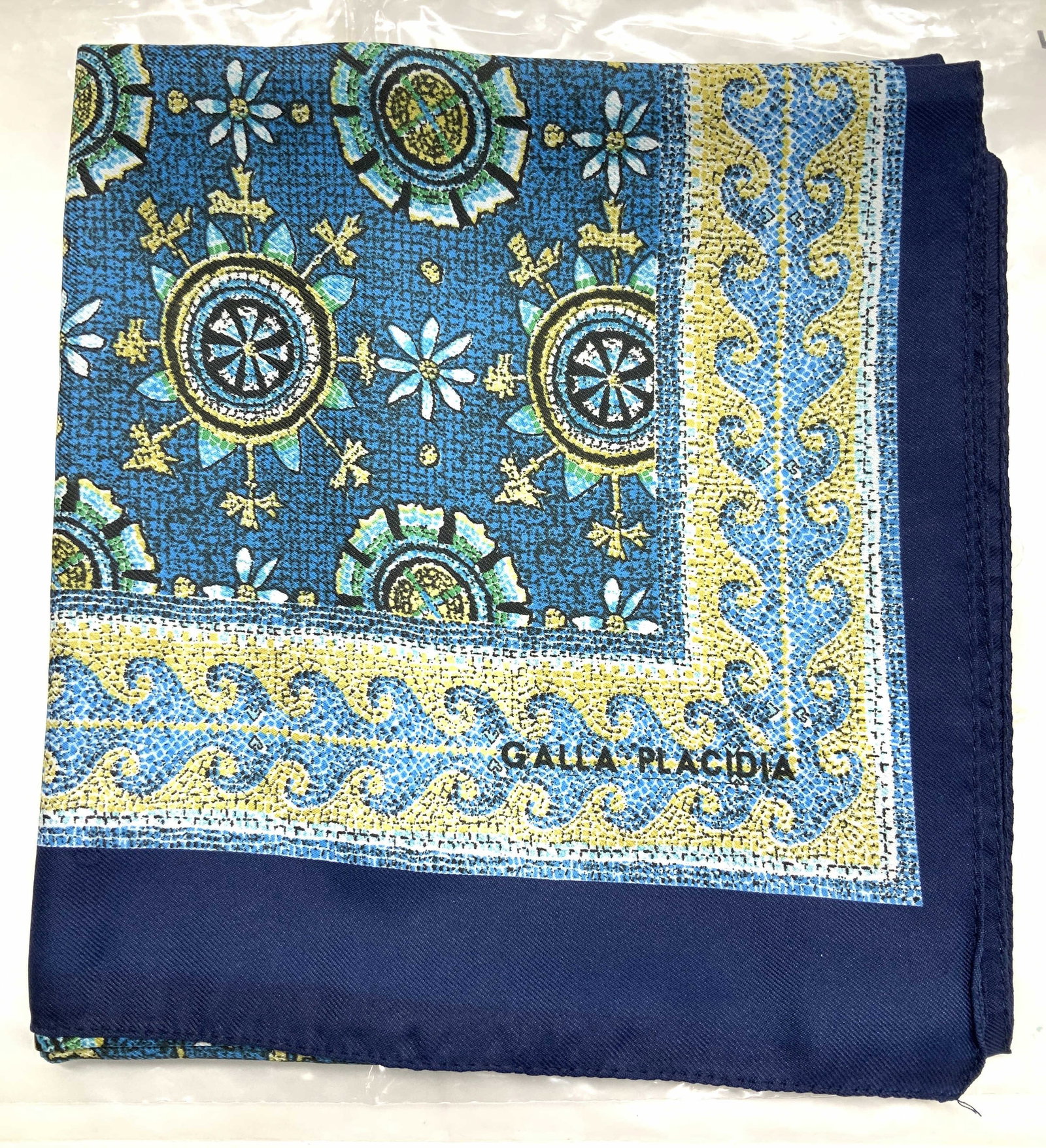 Galla Placidia Scarf of Mausoleum Mosaic Ceiling: Mausoleum Galla Placidia in Ravenna, Italy. Replica of the mausoleum mosaic ceiling dating to 395AD. Soft hand polyester scarf ( feels like silk twill) signed . New in package. Silk scarf made in Ital