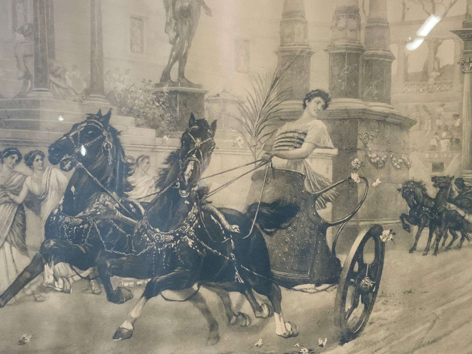 Ettore Forti Victory Framed Lithograph: Lithograph on paper. Subject depicts a Roman chariot doing a victory lap. Framed in stained wooden frame with scrolling molding. Frame measures approx. 33.5 W x 19.5 H in. Window measures approx. 27.5