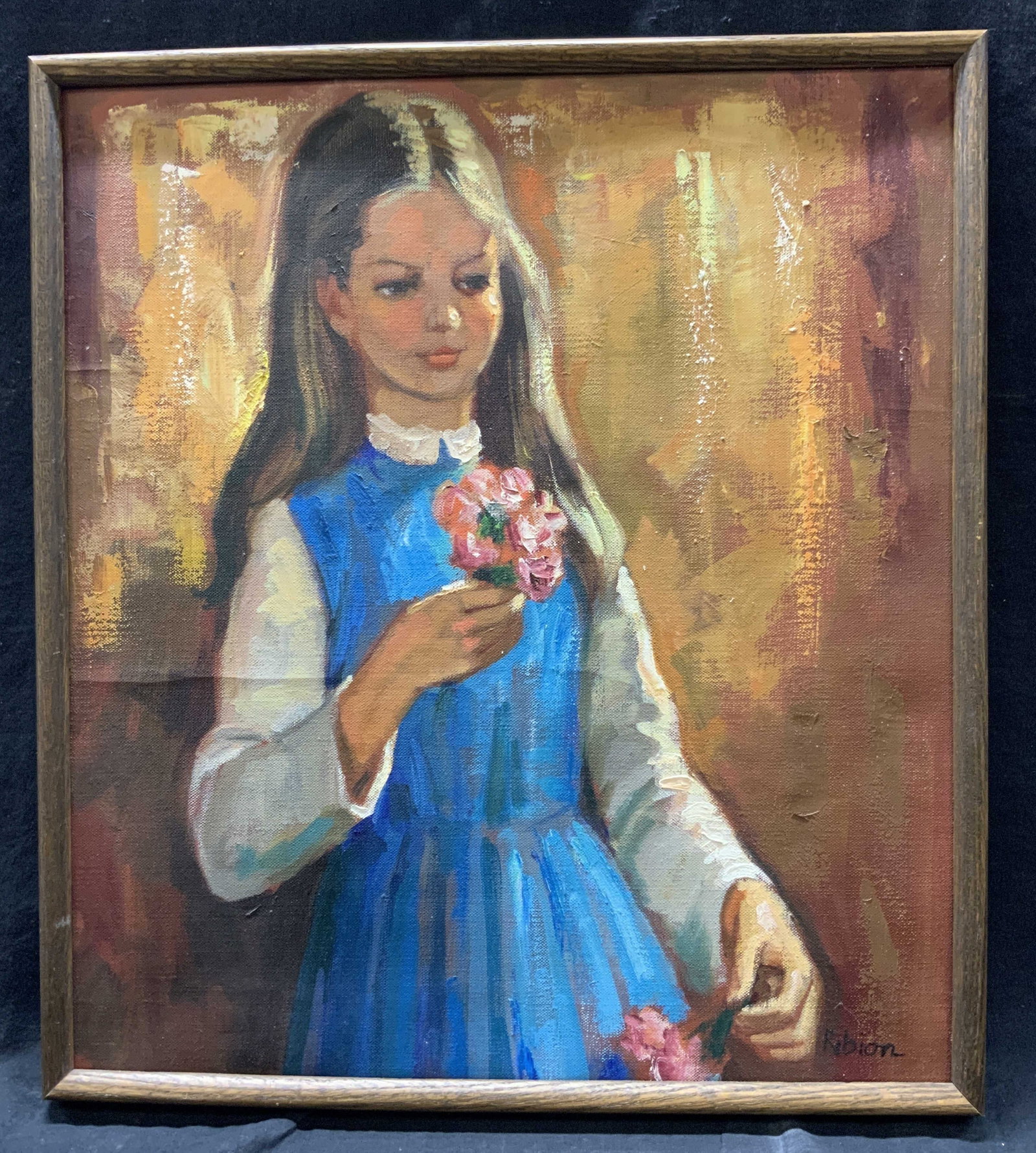 Ribion Signed & Framed Portrait of a Young Girl: Oil paint on canvas. Signed on lower right corner. Signature reads Ribion. Subject depicts a portrait of a young girl holding a flower. Framed in wooden frame. Frame measures approx. 18 W x 20 H in. W