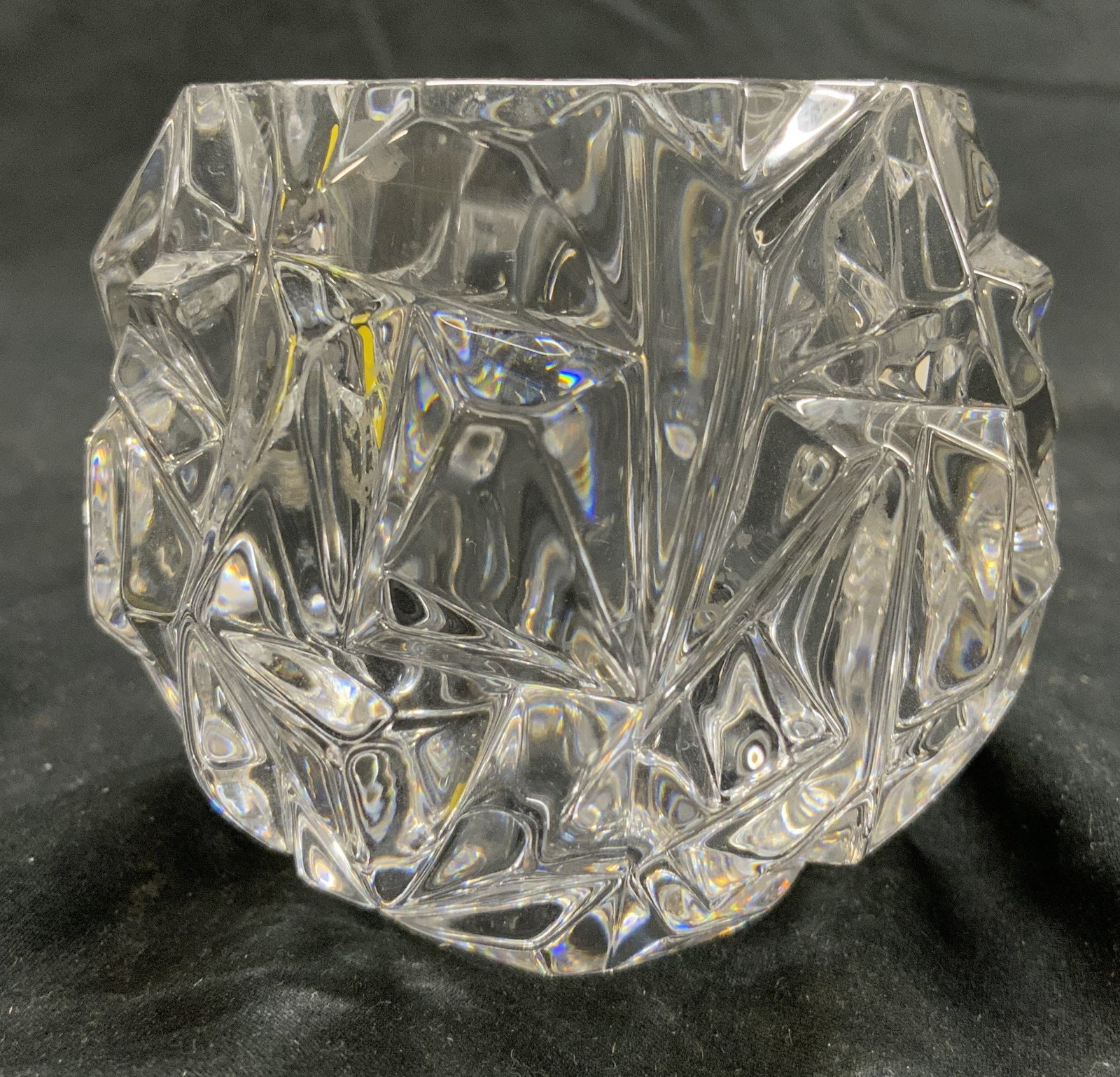 TIFFANY & CO Crystal Votive Candle Holder: Underside of piece is signed TIFFANY & CO. Votive is crystal. Piece has geometric spherical form. Piece measures approximately 3 inches tall 3.25 inches wide. Votive, candle holder, votive candle hold
