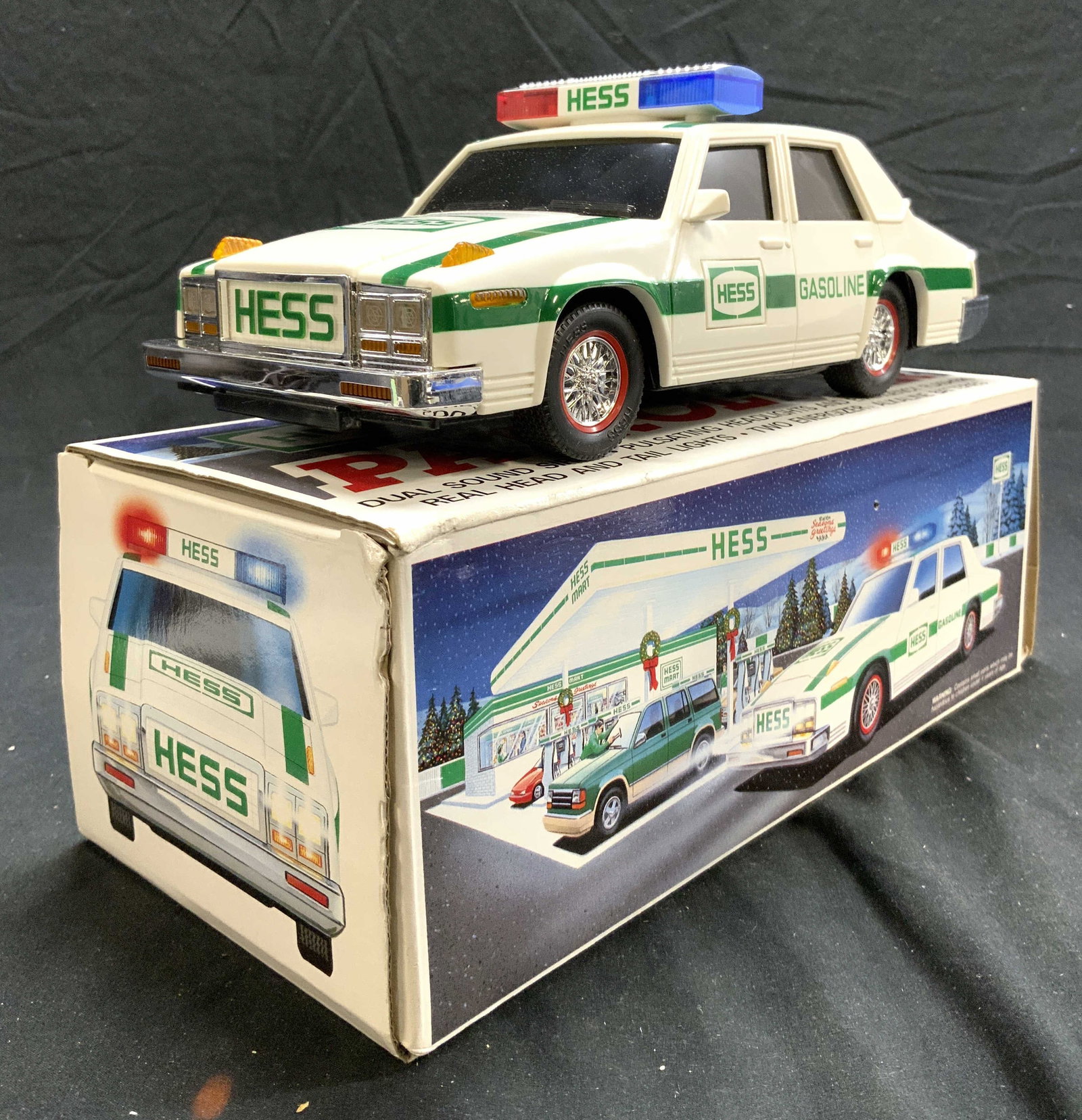 HESS Vintage Patrol Car Holiday Toy Car W Box: Box reads HESS. Piece is vintage. Lot also includes original box. Toy patrol car, white and green toned & reads HESS GASOLINE. Hess Toy patrol car measures approximately 10.75 inches long 4.5 inches w