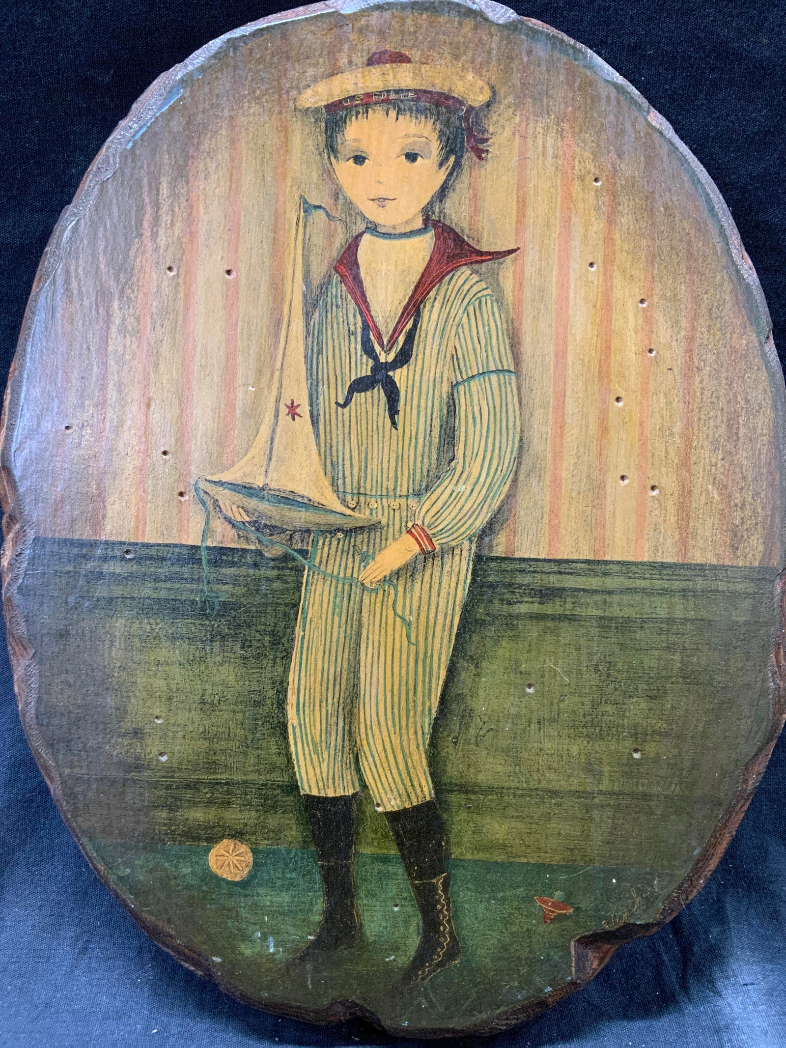 Clare Blanchard Young Sailor Boy Lithograph: Lithograph on wood. Original artist Claire Blanchard. Signature cut off on lower right corner. Subject depicts an illustration of a young boy in a sailors costumes with a sail boat. Wooden plaque. Pla