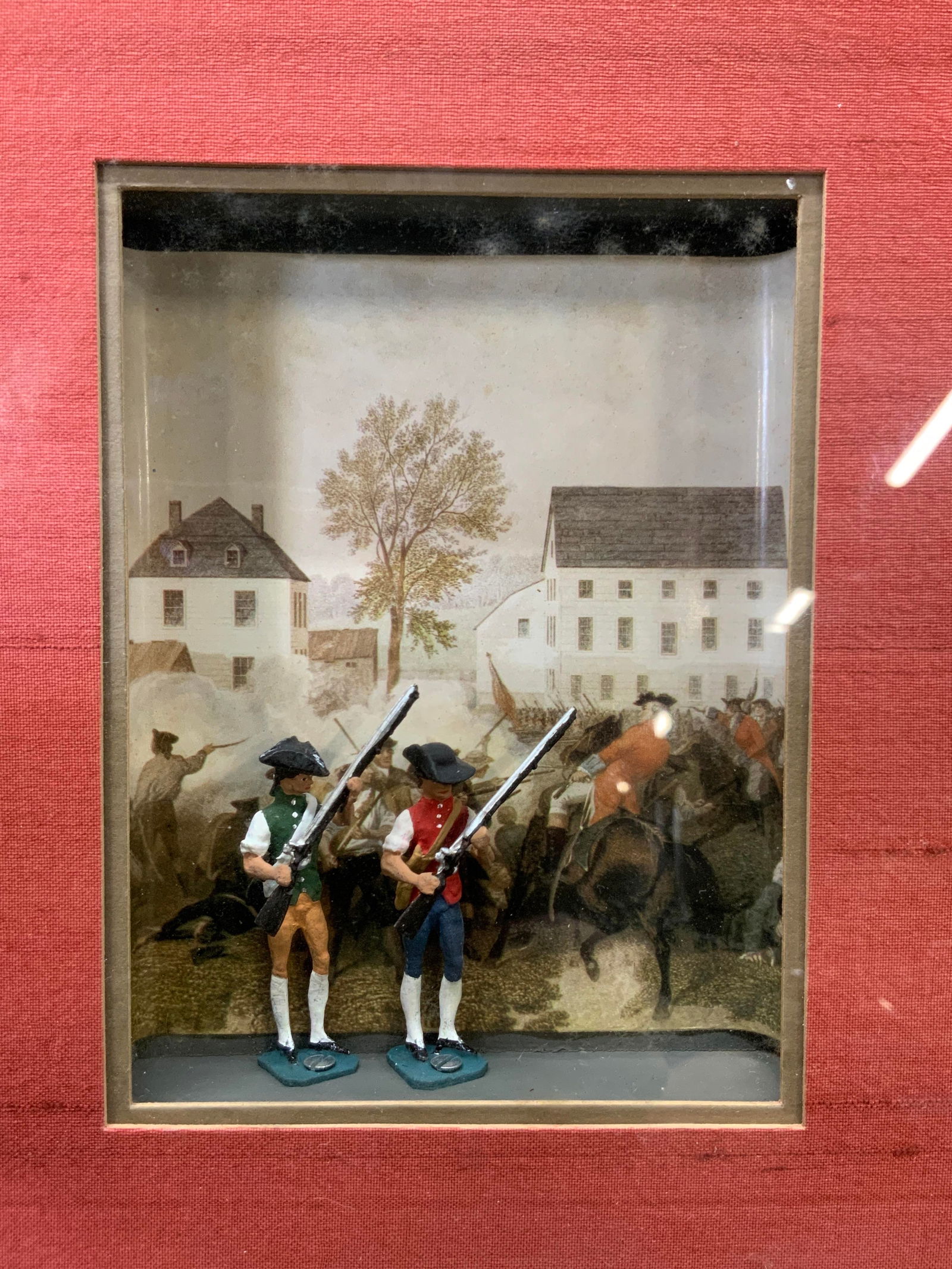 Battle of Lexington Common 1775 Shadow Box: Shadow box with figurines and lithograph background. Subject depicts the battle of Lexington where the first shot of the revolution took place. Two hand-painted militia and minuteman miniature figurin