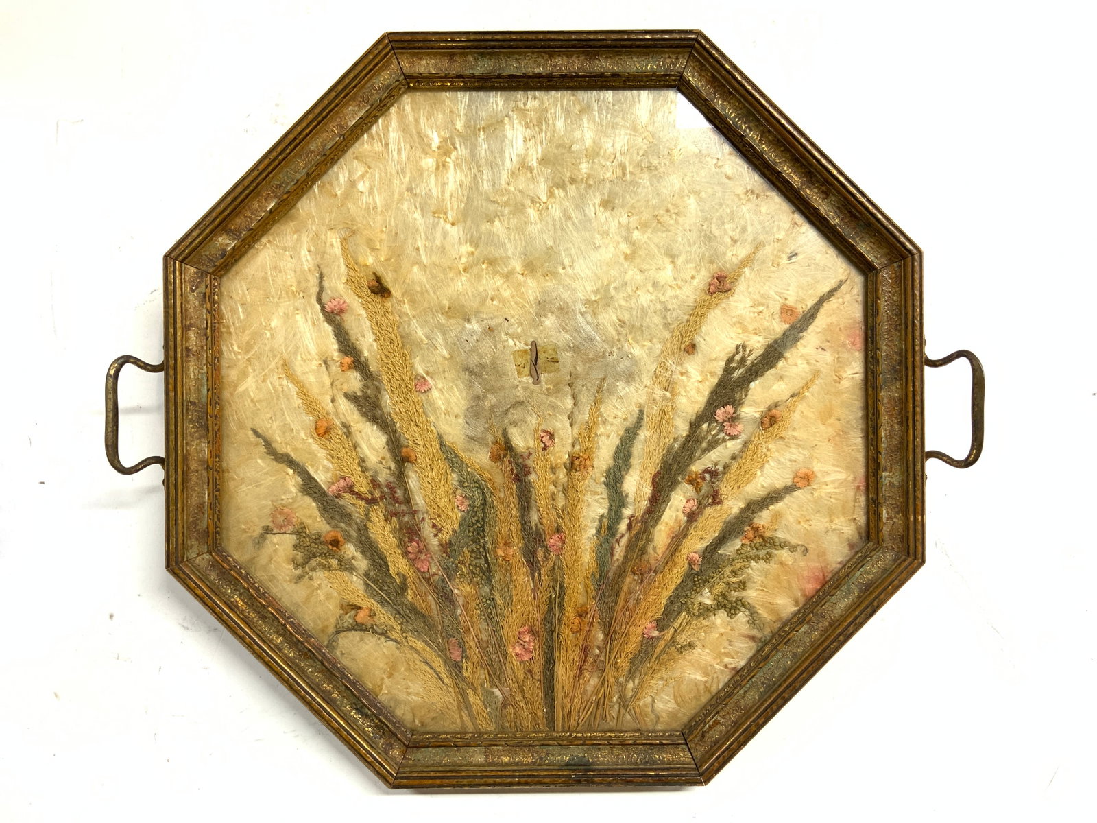 Art Nouveau Pressed Floral Tray W Handles: Tray has gilt wood octagonal form frame. Piece has gilt metal handles. Center of piece has pressed floral/plant detail with glass insert. Vintage art nouveau style tray. Piece measures approximately 1