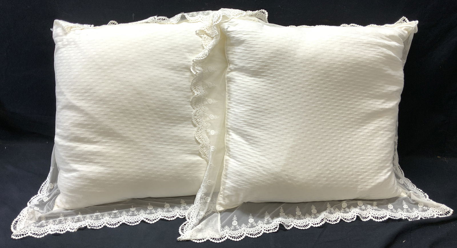 Lace Throw Pillows White: Pillows are each white toned. Each pillow has intricately detailed lace edges. Each pillow measures approximately 31 inches square including lace edge 7 inches deep. Pillows, throw pillows, lace pillo