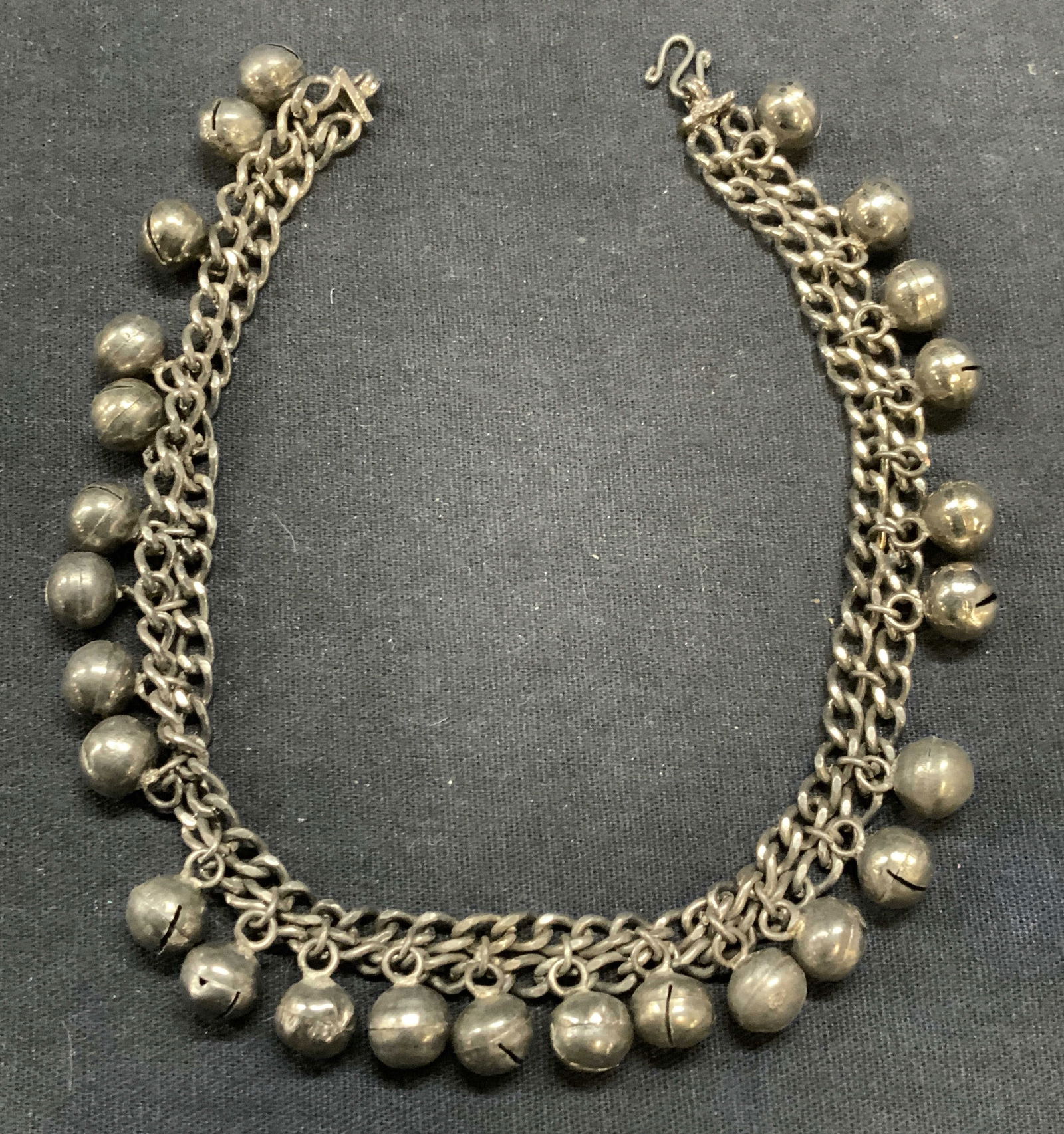 Silver Tone Bell Beaded Choker Necklace: Silver tone choker necklace with bell beads. Drop length approx. 5 inches. Some bells need replacement. Some surface wear including scratching observed. Estate jewelry, costume jewelry, cocktail jewel