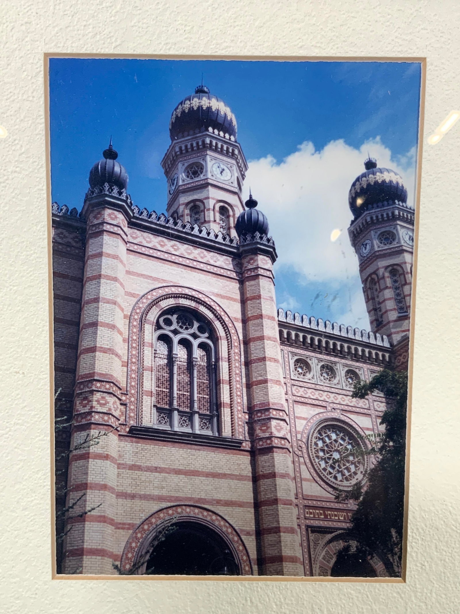 Framed Budapest Synagogue Photograph: Framed photograph. Photo depicts a Budapest synagogue. Framed in green wooden frame. Frame measures approx. 11 W x 13 H in. Window measures approx. 7.5 W x 9.5 H in. Not viewed outside of frame. Frame