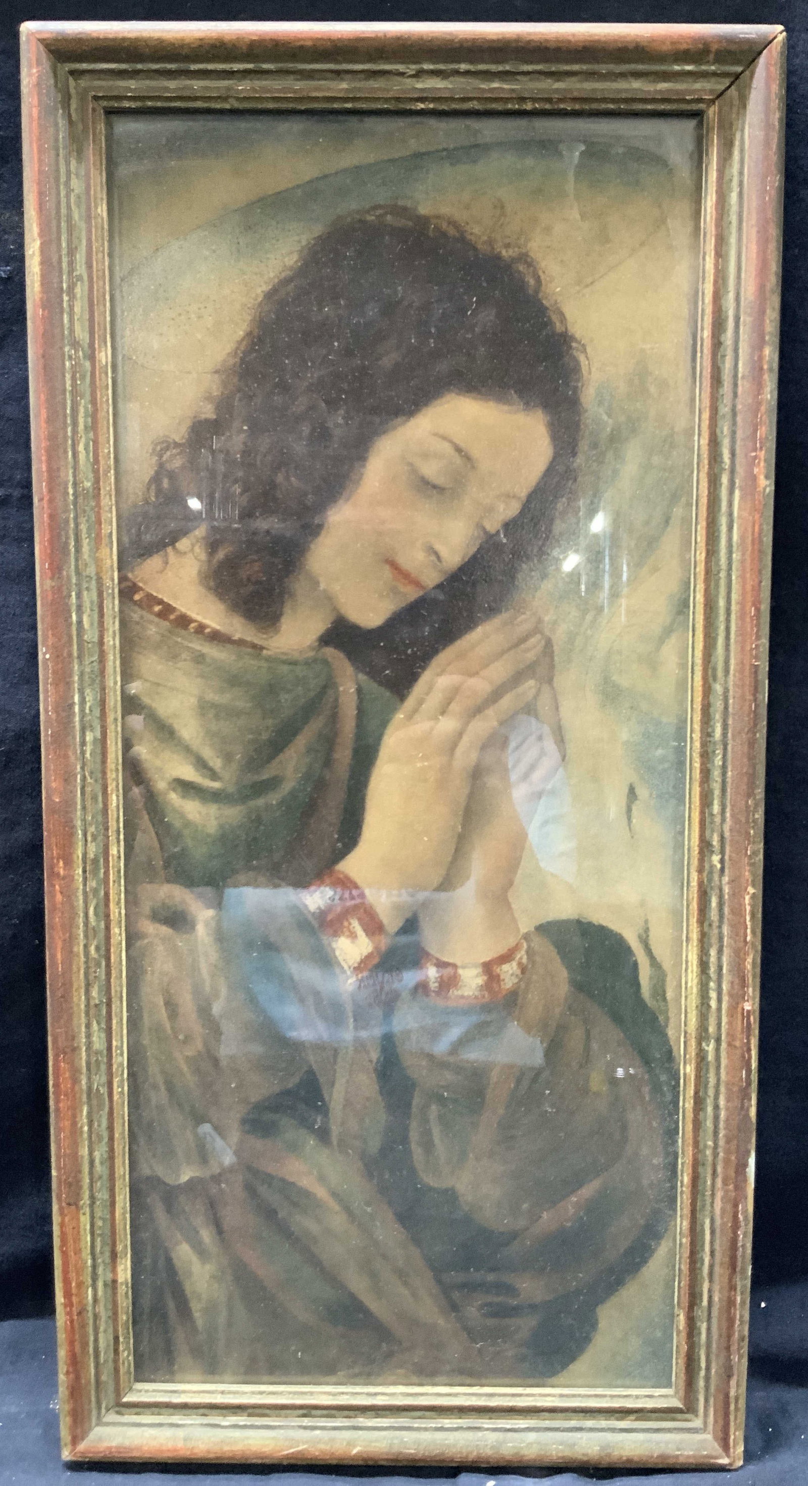 Filippo Lippi Full Colored Angel Adoring Litho: Full colored lithograph of An Angel adoring by Filippo Lippi. Depicting the angel praying with a halo overhead. Framed in a wooden frame approx 20 x 10 inches, window measures 18 x 8 inches. Evident l