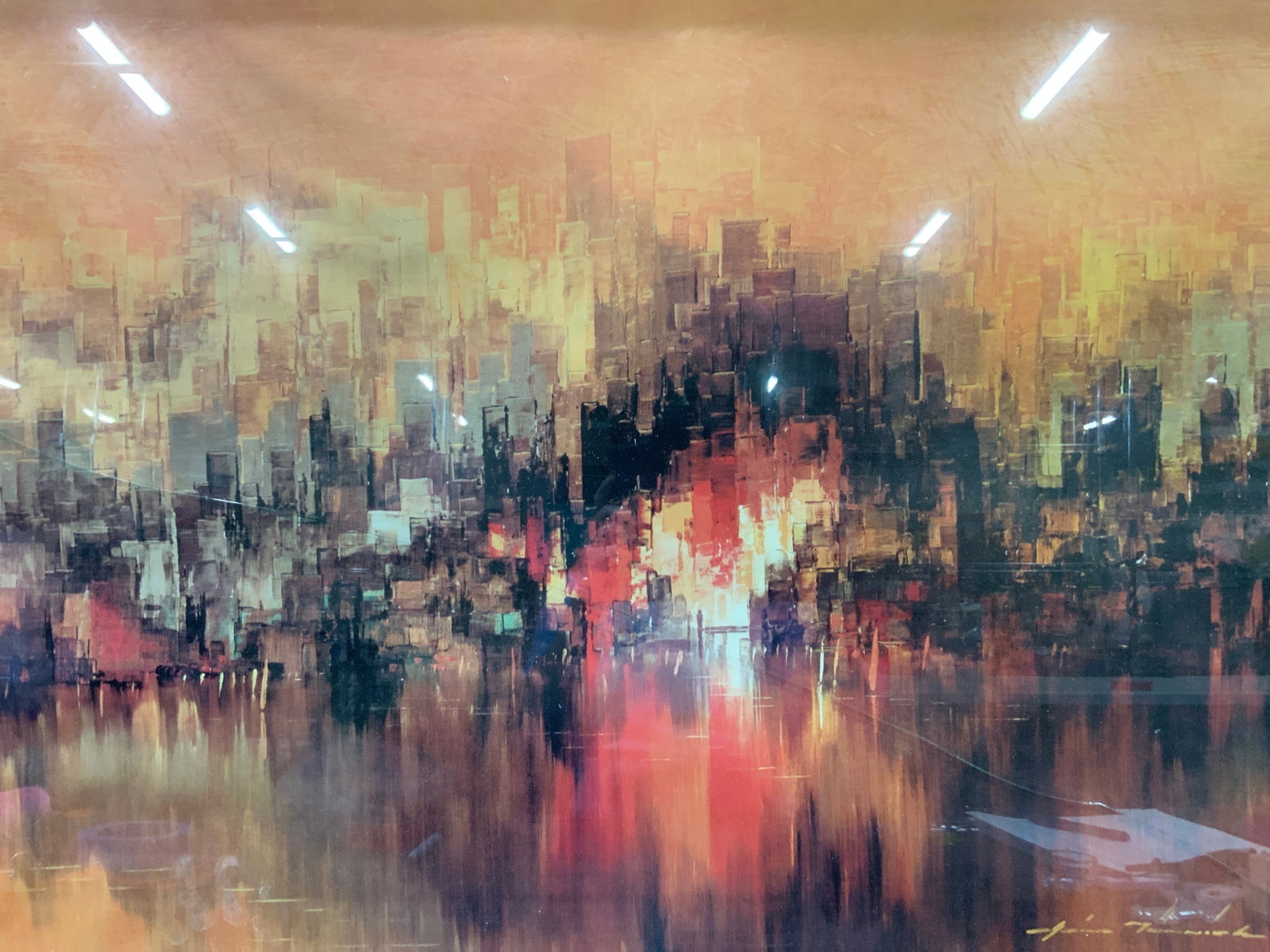 Hertz Munnich Reflected City Lithograph: Marked Hertz Munnich on corner Reflected city lithograph depicting the red and orange toned city from a distance. Frame in a silver toned metal frame. Approx 2ft x 3ft window measures 23.5 x 35.5 inch