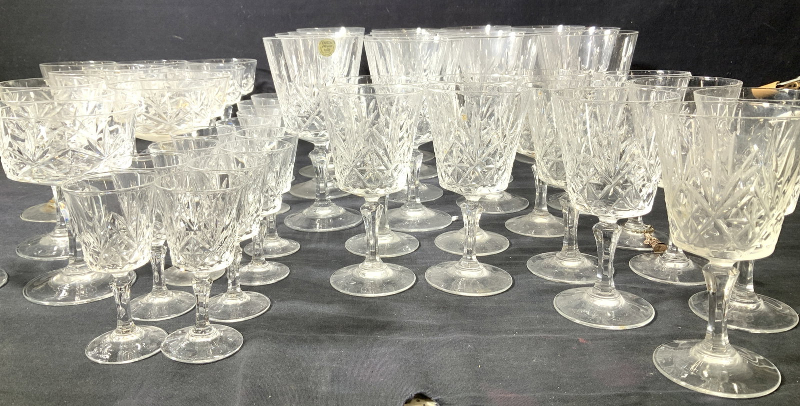 Cristal dArques Lead Crystalware 49, France: Hand blown and hand cut vintage Cristal dArques Taille lead Crystalware set of 49. Made in France. 1 glass has the sticker label. Reads cut genuine, lead crystal, France. Set includes: 13 red wine gla