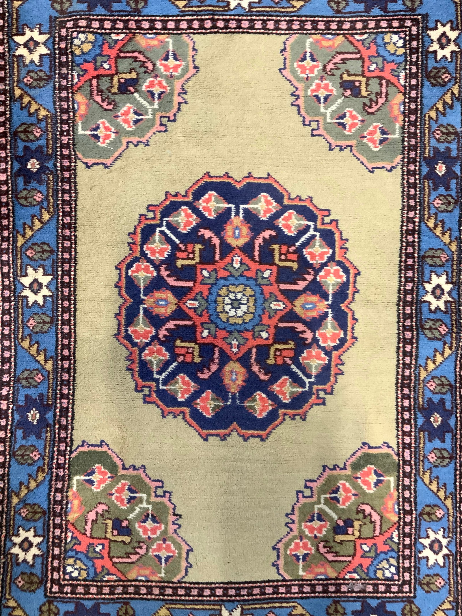Vintage Handmade Persian Wool Area Rug: Rug is handmade and wool. Piece has intricate multi toned floral motif & geometric derail. Rug is vintage. Piece measures approximately 43 inches long 28 inches wide Rug, carpet, wool rug, fringed rug