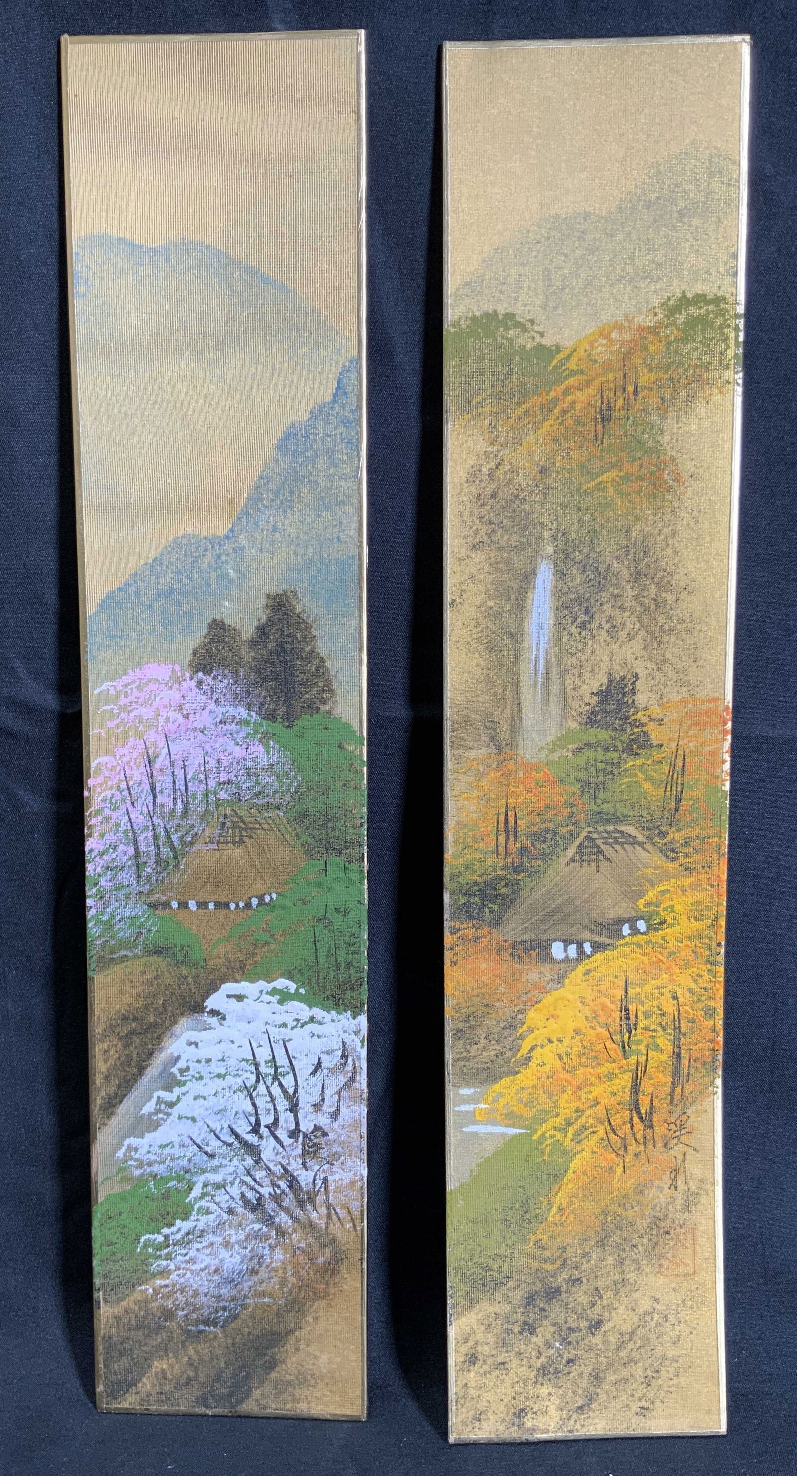 2 Hand painted Gilt Silk Spring & Fall Paintings: Hand painted on gilt silk. Hanko and Asian characters in lower right corners. Subject depicts the same landscape in two different seasons, spring and fall. Each silk piece measures approx. 3 W x 14.25