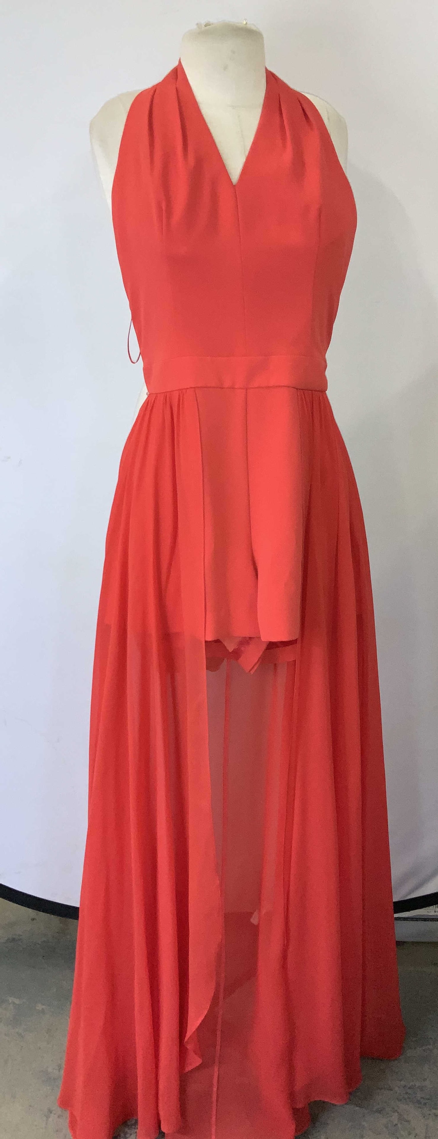 Trina Turk Red Silk Shorts Romper w Sheer Skirt: Luxury designer Trina Turk red Verlaine Romper , never worn, new old stock with tag attached. Bright red silk with a sheer flowy silk skirt . Halter neck with buttons and a snap. Short shorts with poc