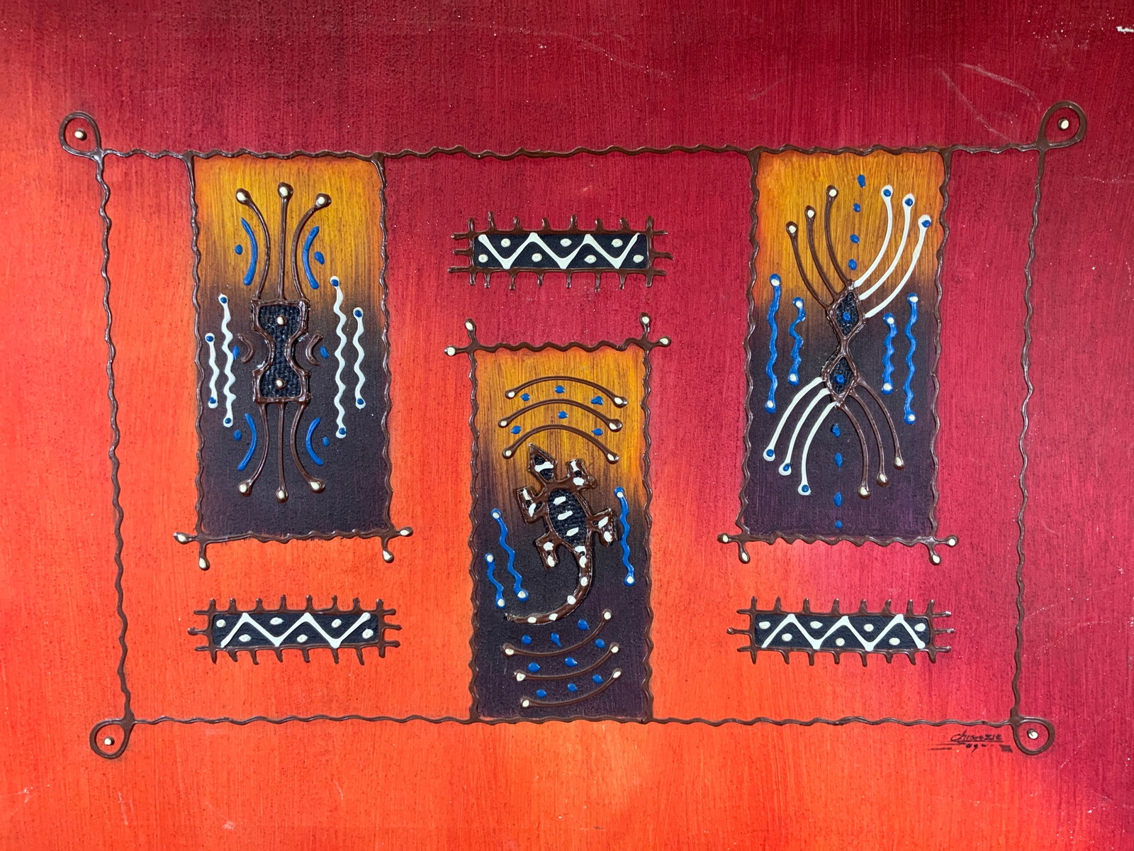 Signed Tribal Low Relief Textured Wall Art: Acrylic paint textured with sand. Low relief on canvas. Signed in lower right corner. Signature illegible. Subject depicts framed shapes with different gradients and tribal motifs inside using paint, 