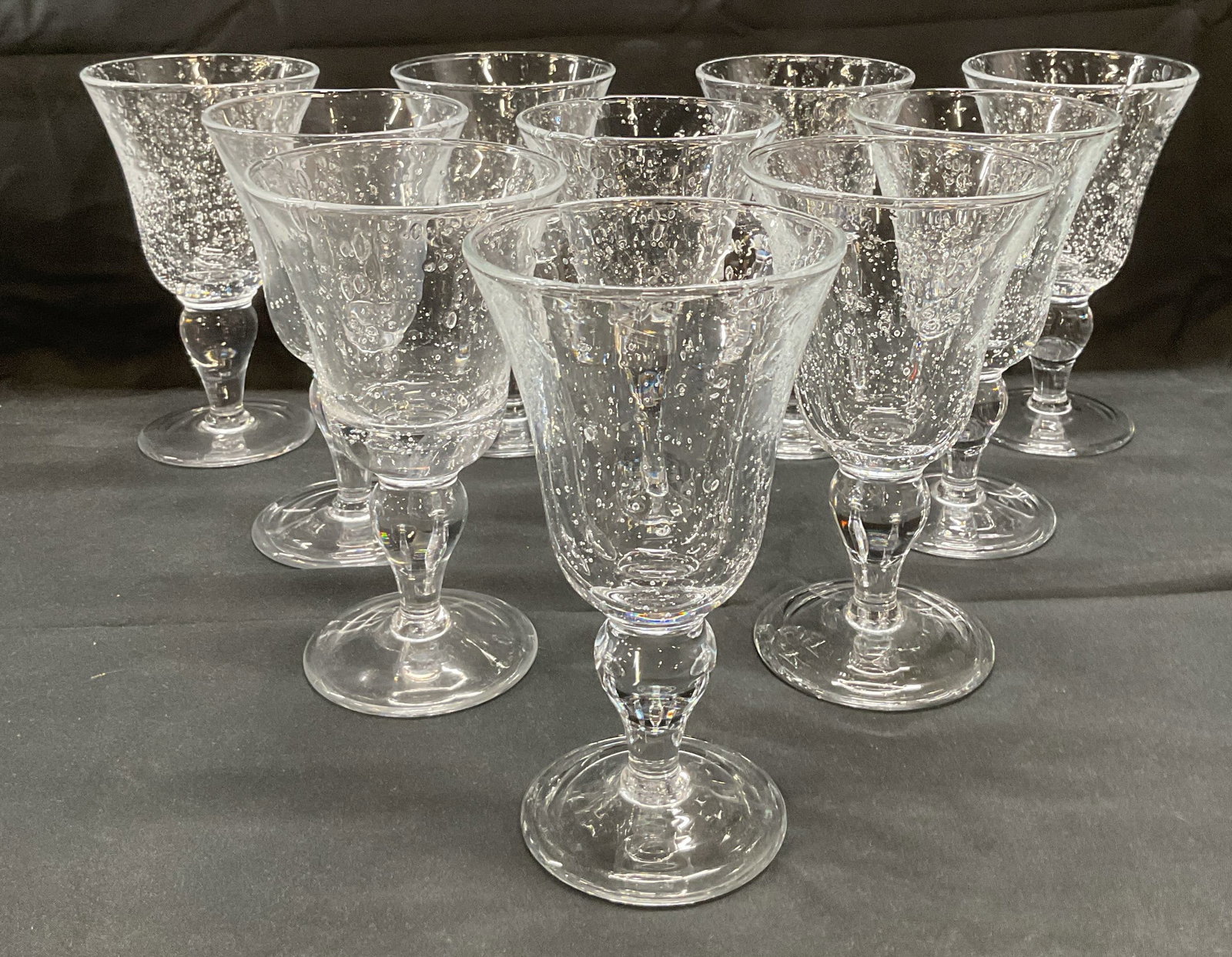 Set 10 Bubble Glass Wine Glasses: Set of 10 bubble glass wine glasses. Thick walled glass. Measure approx. 4 x 7 inches each. All pieces have some surface wear including scratching observed. Wine glass, wine glass set, bubble glass, B