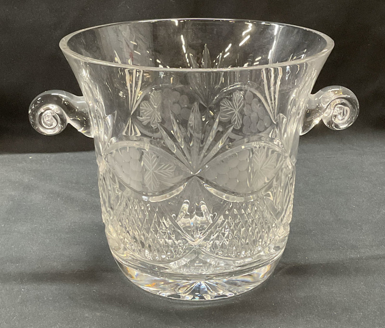 Cut Crystal Grape Motif Ice Bucket: Cut Crystal ice bucket with grape motif and diamond pattern. Measures approx. 6.75 x 6.5 inches. Thick walled crystal. Some surface wear including scratching observed. Ice bucket, crystal ice bucket, 