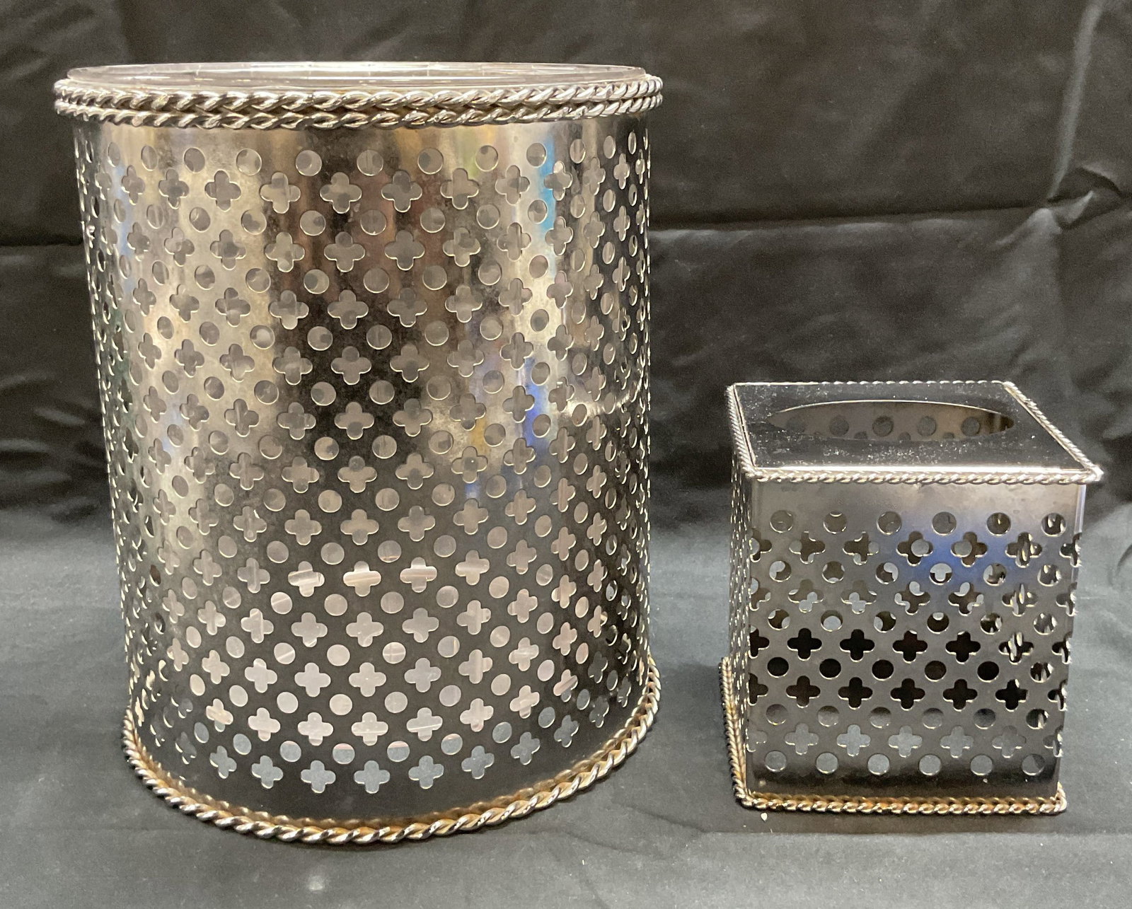 Lot 2 Silver Tone Waste Basket & Tissue Cover: Silver tone pierced circle and club motif waste basket and tissue cover. Waste basket measures approx. 9 x 10.5 inches. Tissue cover measures approx. 5 x 5 x 5.5 inches. Both pieces have some surface 