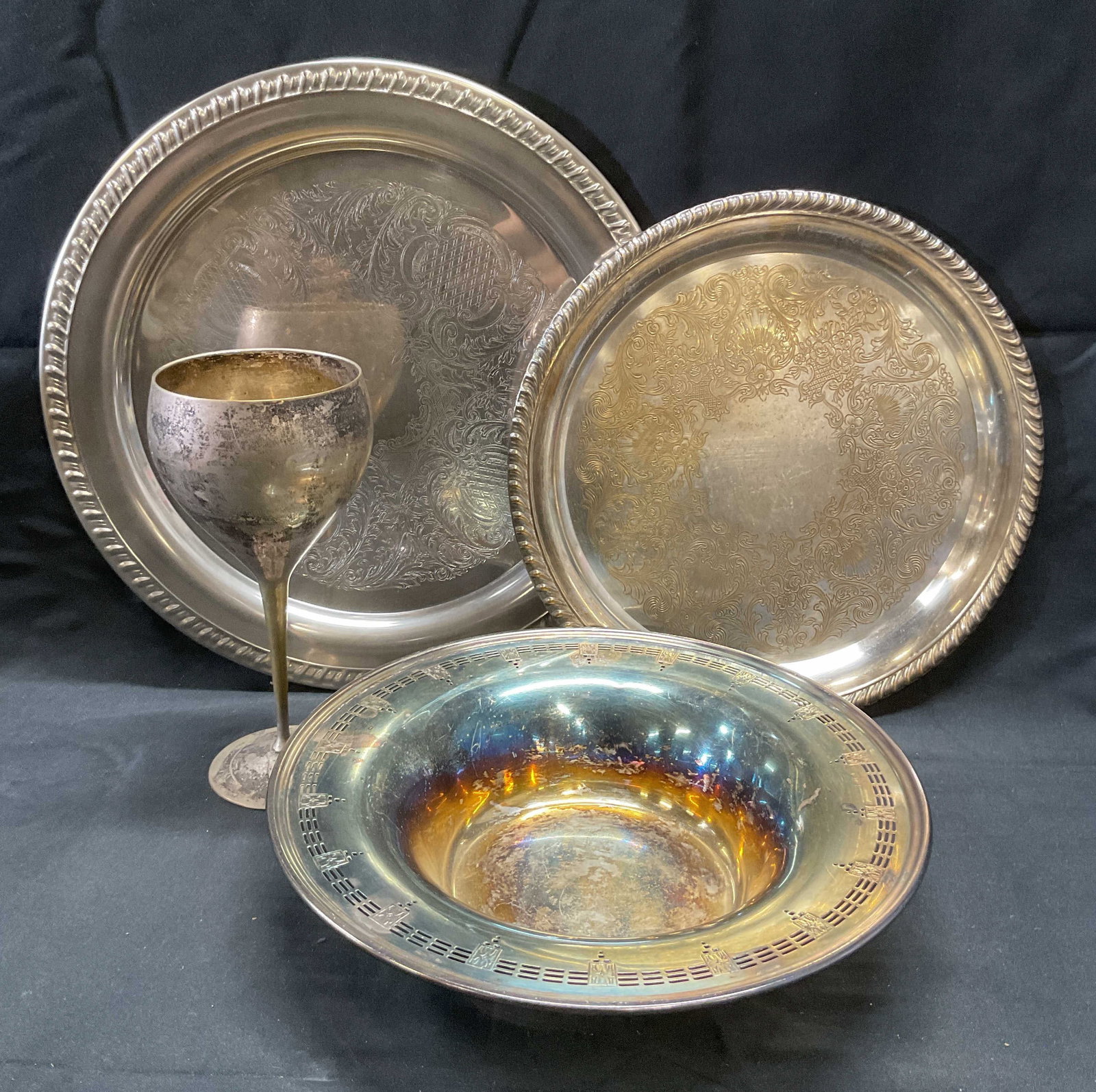 Lot 4 Leonard & Rogers Silver Pl Platters +: Vintage Leonard silver plated platter with chased scroll motif. Signed to underside. Made in Italy. Measures approx. 12 inches diameter. Vintage Leonard silver plated wine glass. Signed to underside.