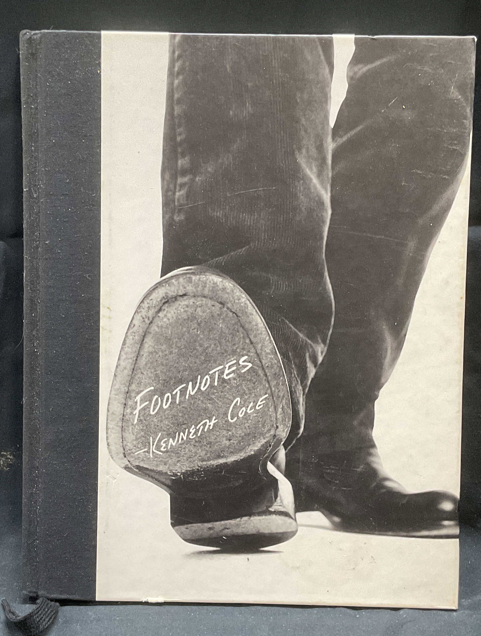 Signed Kenneth Cole Footnotes Book: Signed hardcover copy of Footnotes by Kenneth Cole. Signed by author on interior cover. Published by Simon and Schuster, 2003. Contains illustrations. Measures approx. 11.25 x 8.75 inches. Some wear t