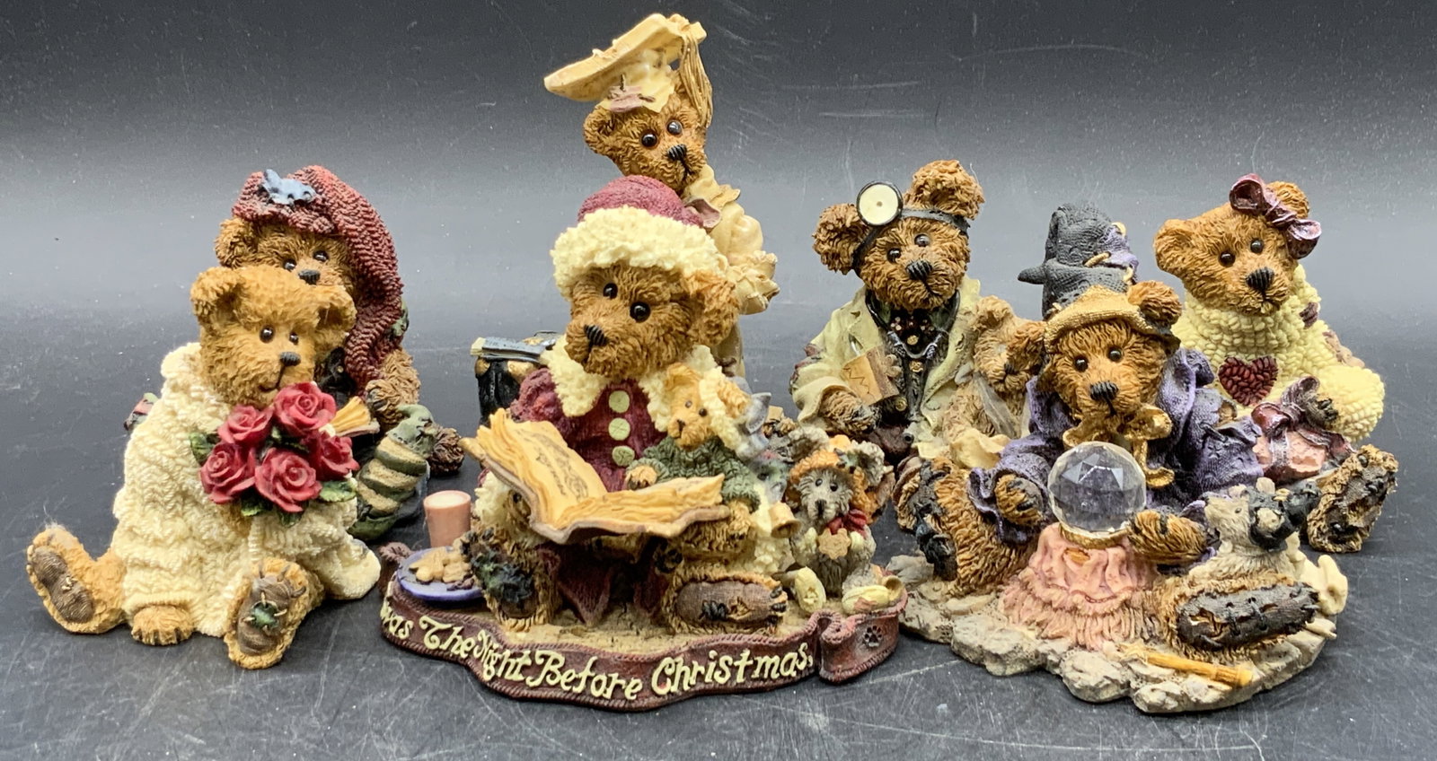 Lot 7 Vintage BOYDS BEARS & FRIENDS Bear Figurals: Seven vintage resinous bear figurals. The bears are wearing various outfits / feature various themes. Largest measures approx. 3.5H x 4.25W in. Undersides are signed BOYDS BEARS & FRIENDS. Some pieces